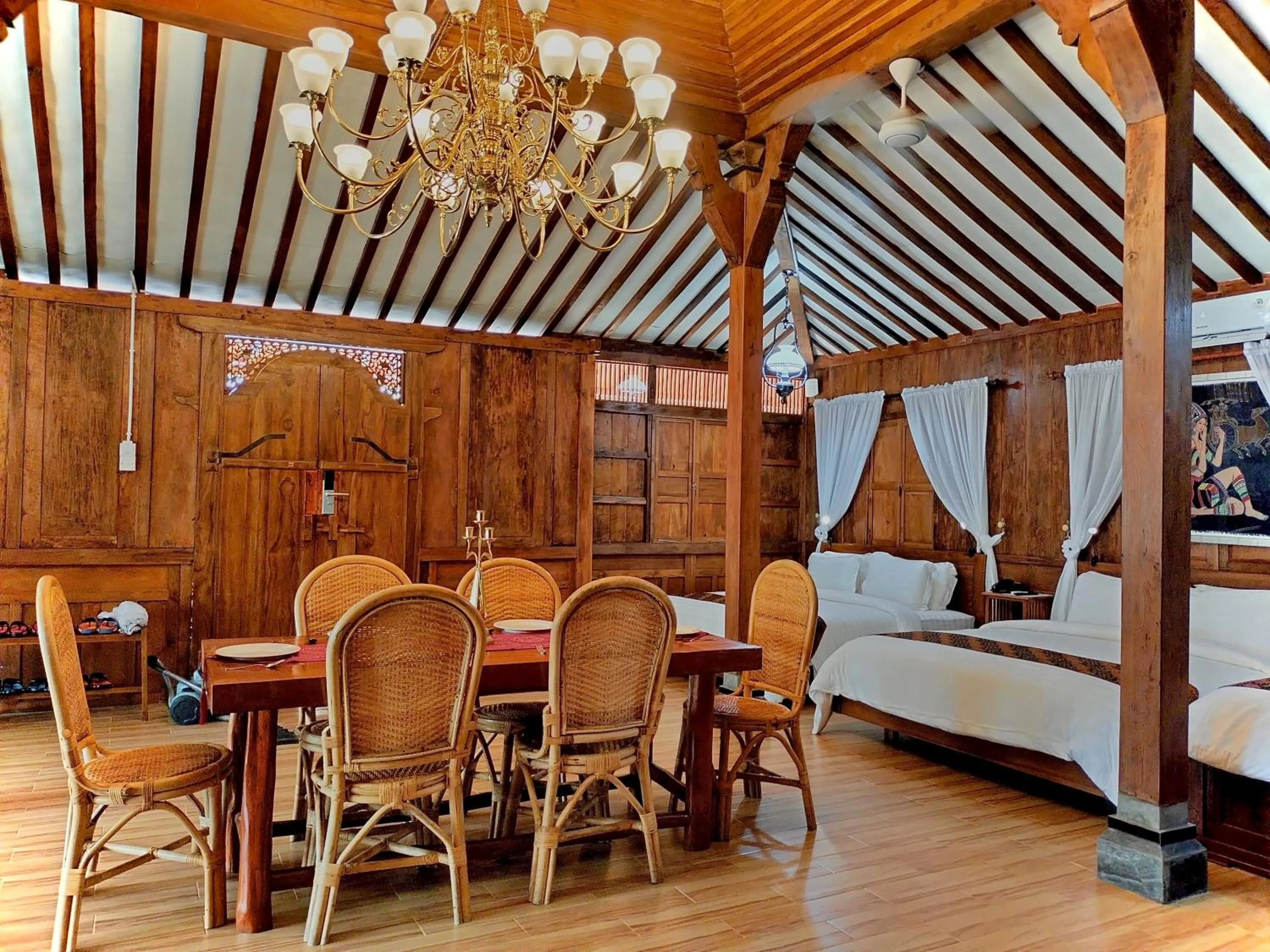 Living room, Bed in Bintan Exotica Resort By Waringin Hospitality