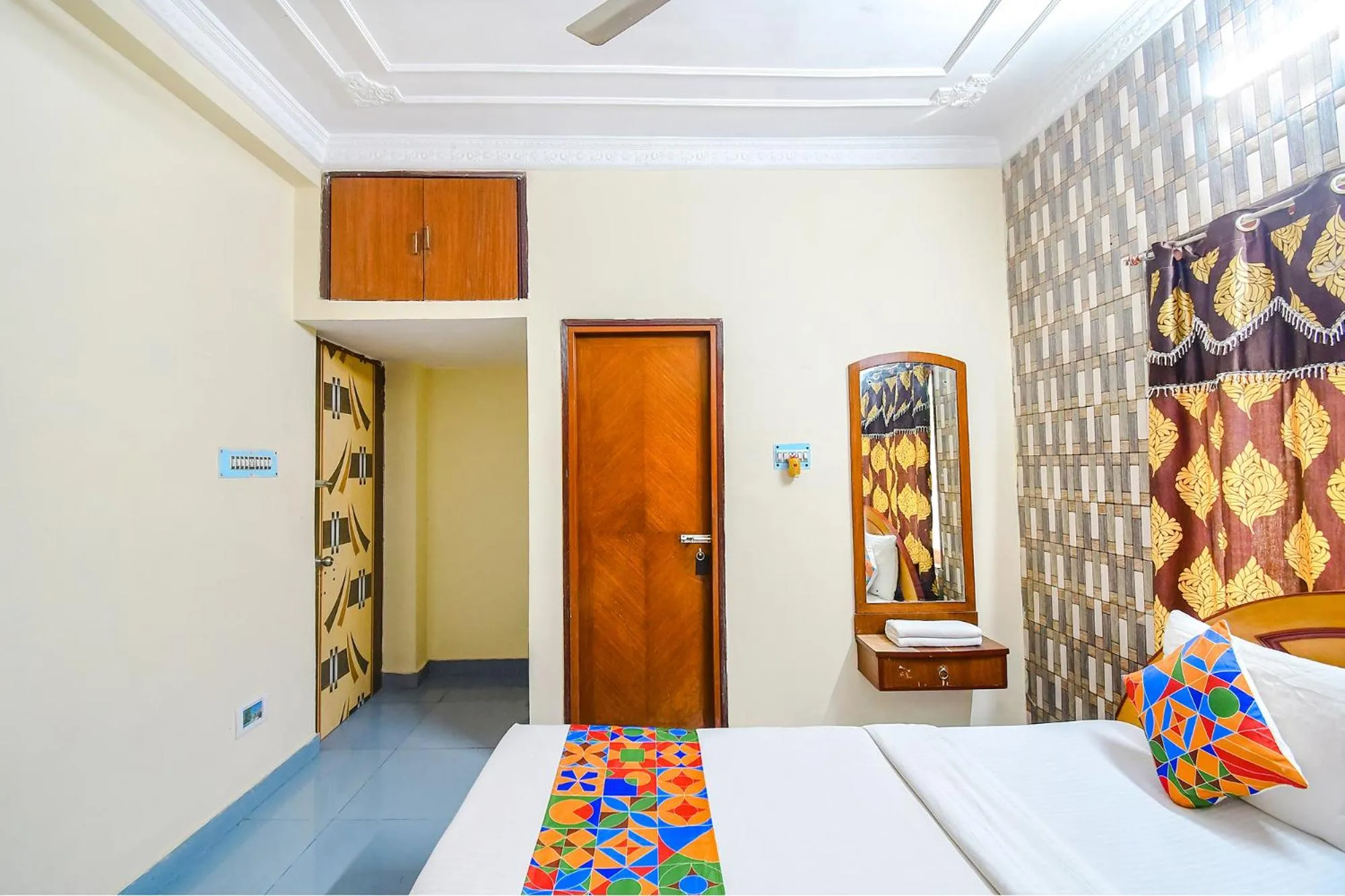 Bed in FabHotel Heritage Inn