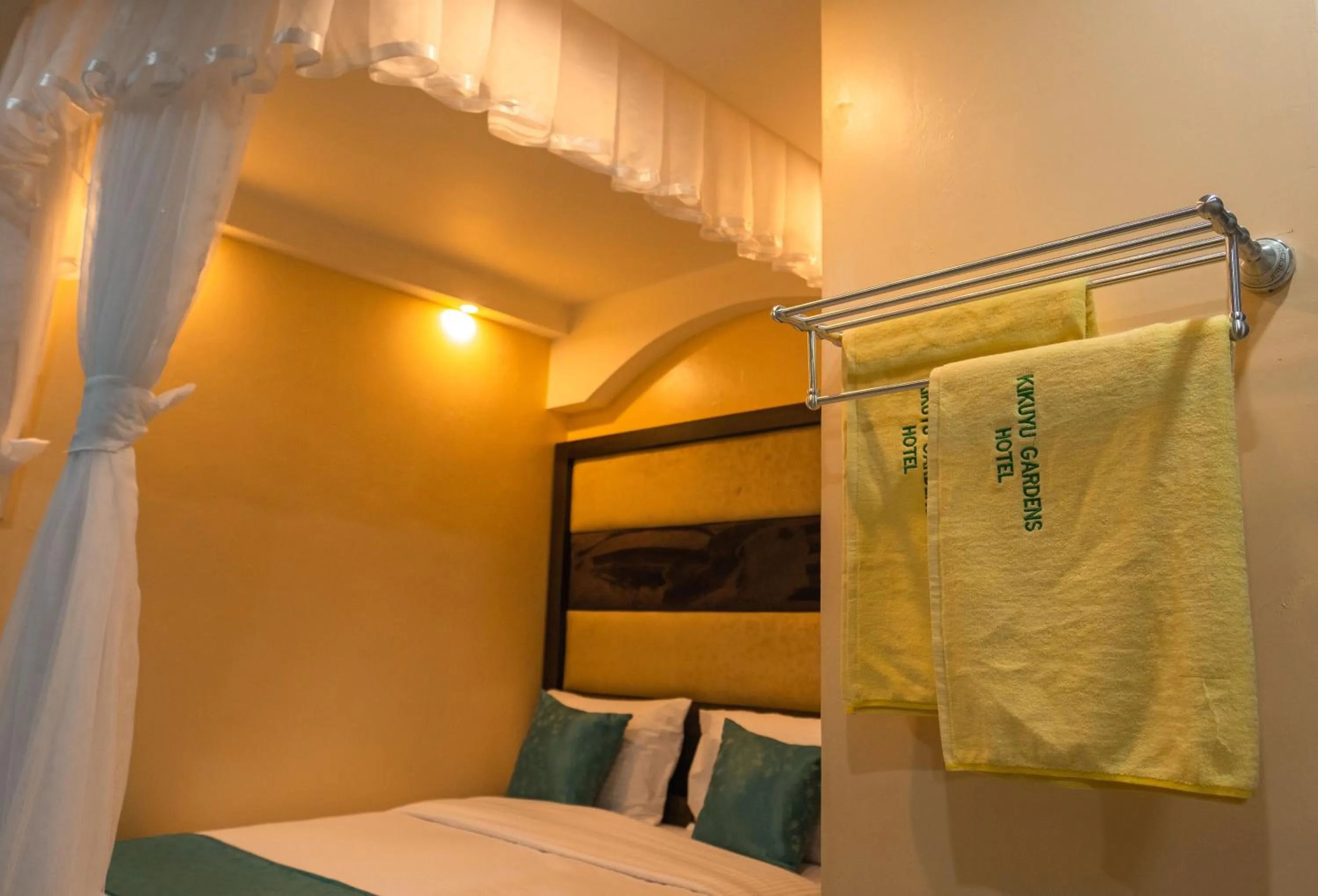 Bed in Gardens Executive Suites