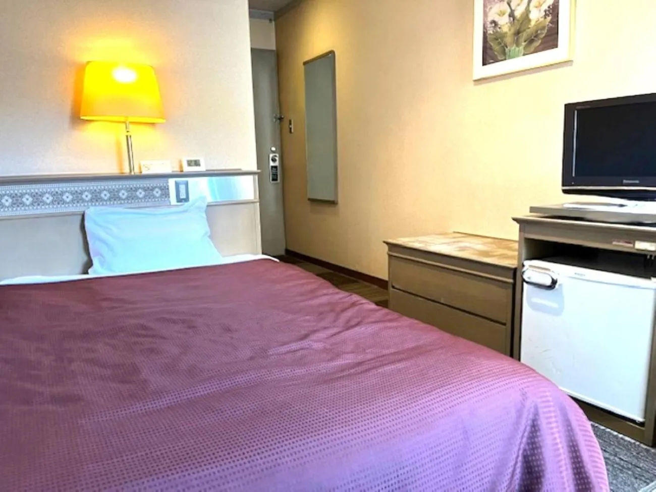 Bed in Hotel Seiryu Japanese Spa inn with spectacular view in Osaka