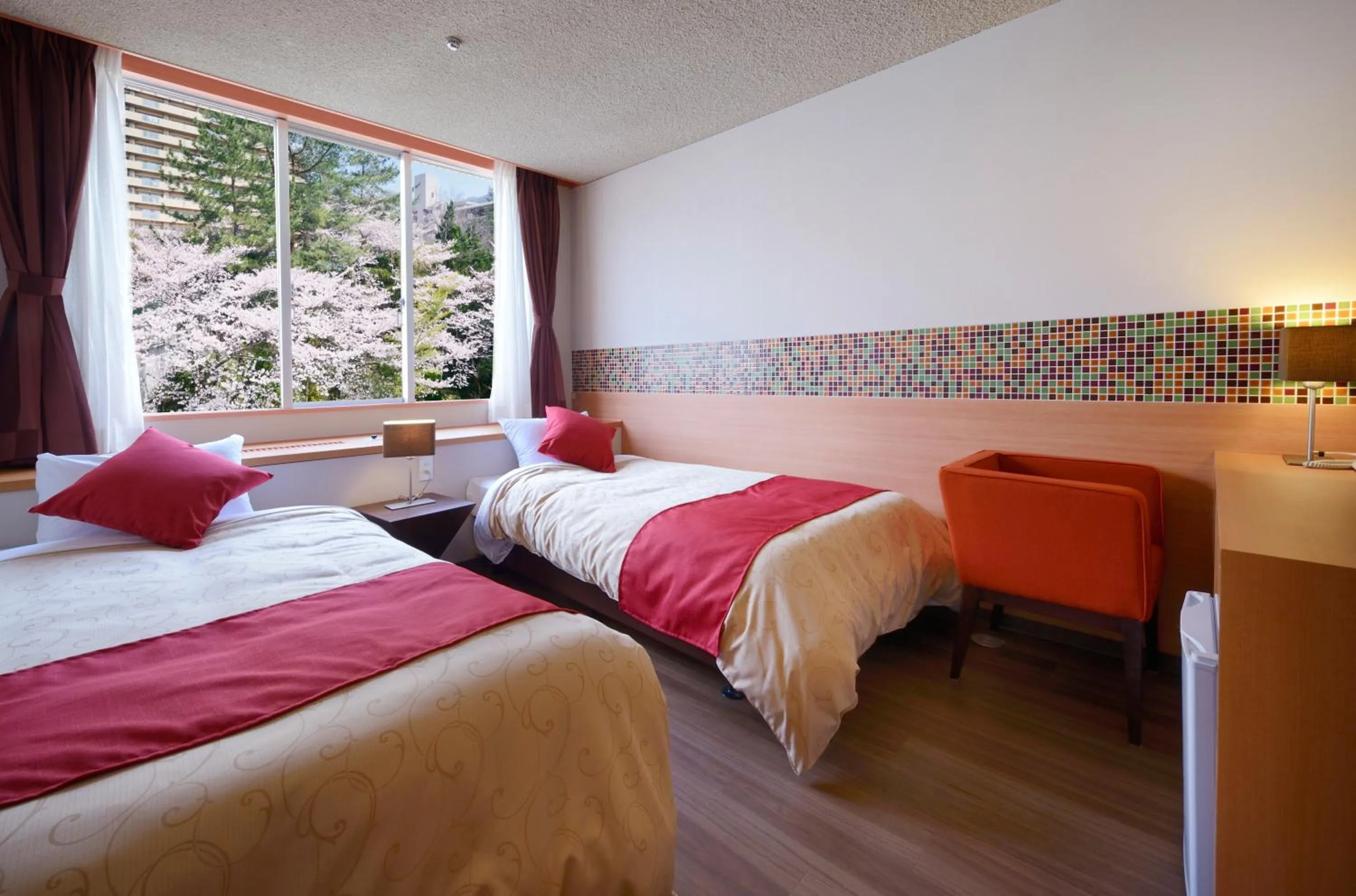 Bed in Hotel Seiryu Japanese Spa inn with spectacular view in Osaka