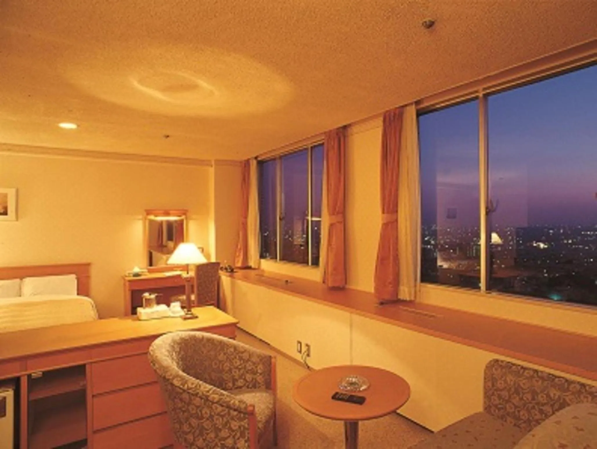 Bed in Hotel Seiryu Japanese Spa inn with spectacular view in Osaka