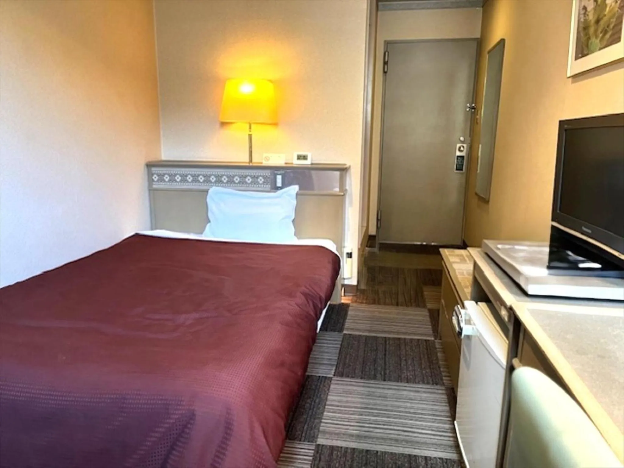 Bed in Hotel Seiryu Japanese Spa inn with spectacular view in Osaka