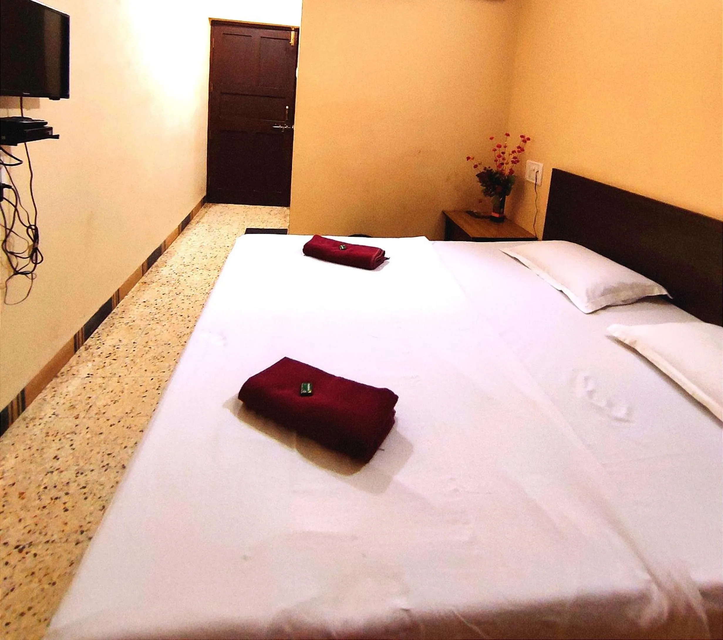 Bed in Mandarin Hotel Mapusa