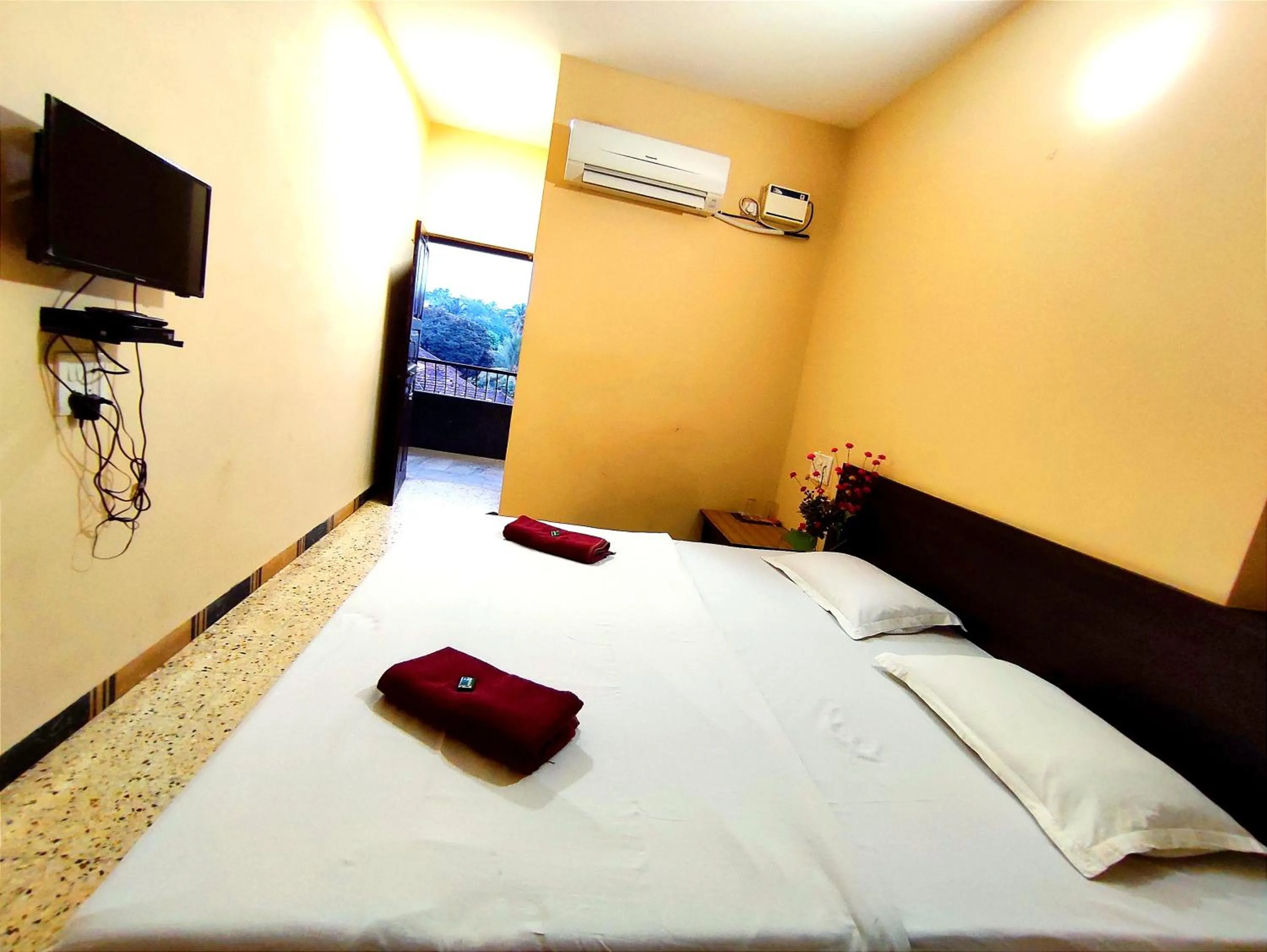 Bed in Mandarin Hotel Mapusa