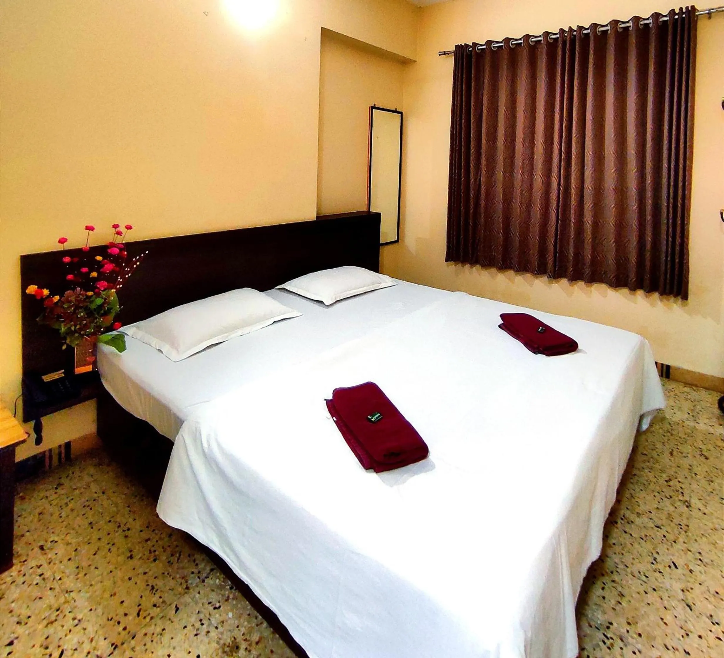 Bed in Mandarin Hotel Mapusa