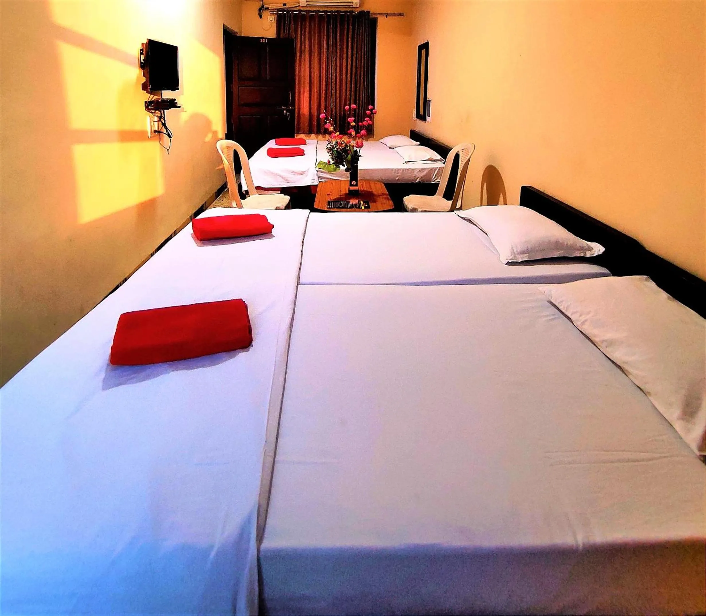 Bed in Mandarin Hotel Mapusa
