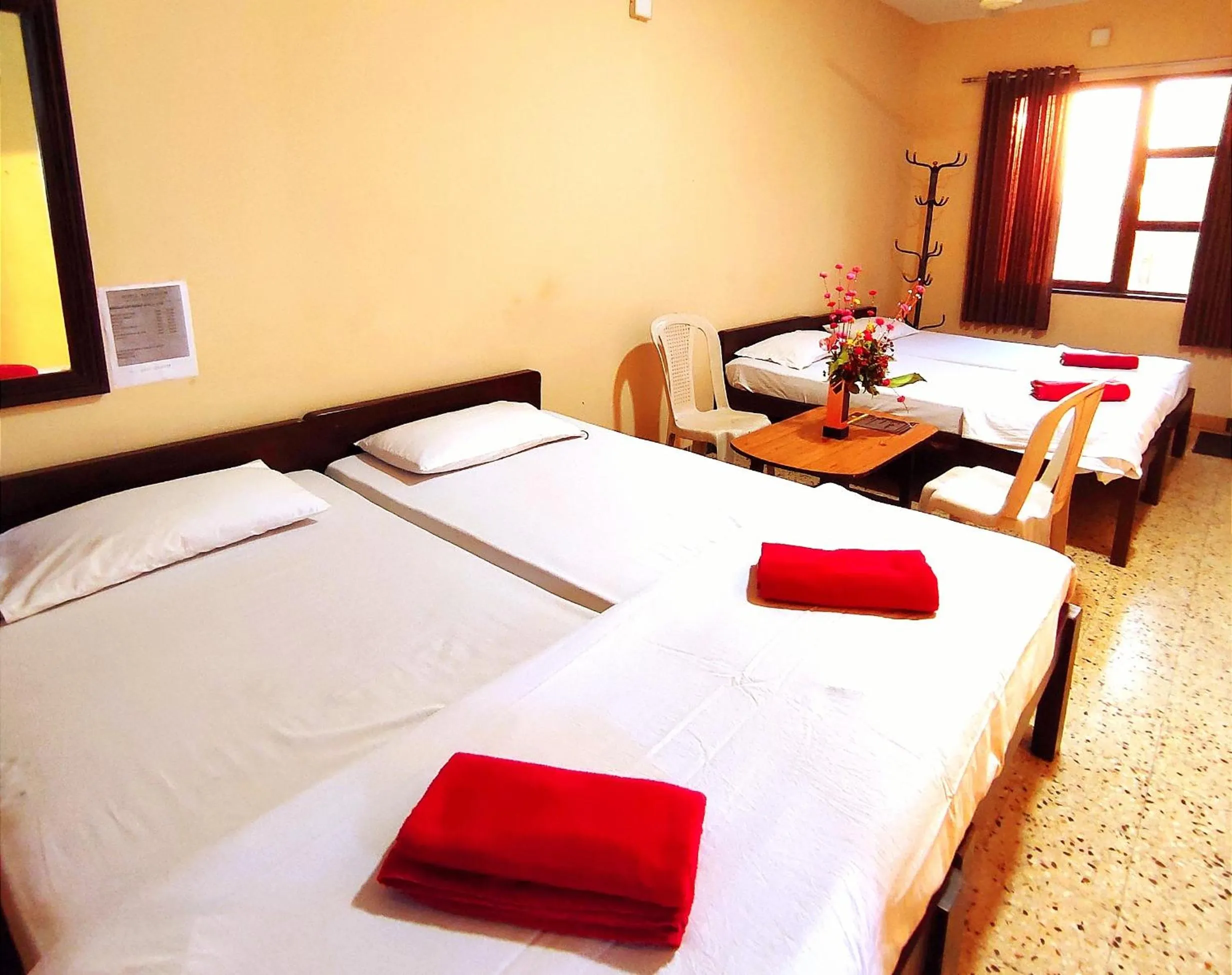 Bed in Mandarin Hotel Mapusa