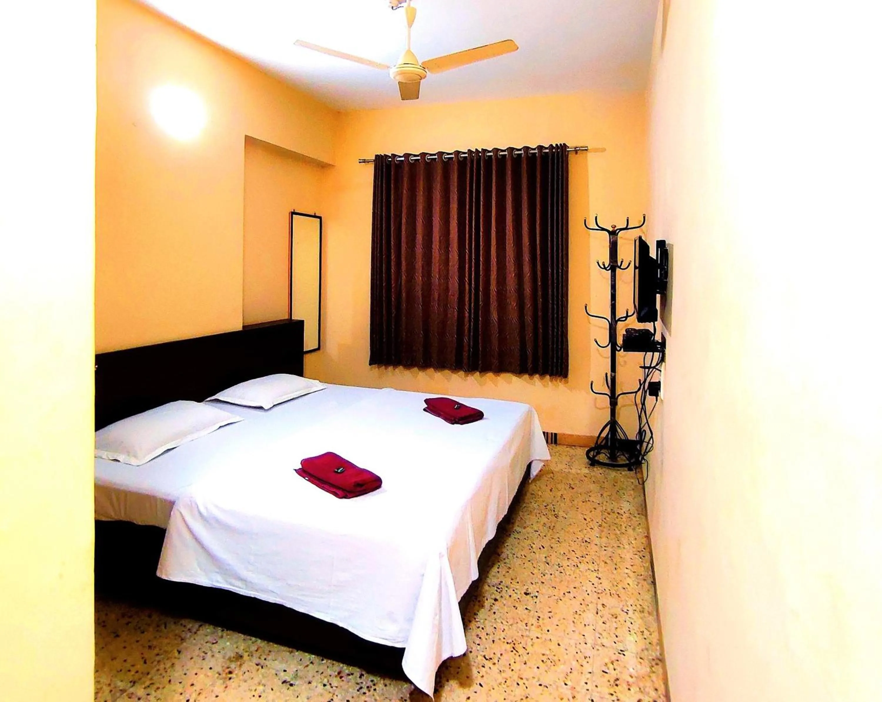 Bed in Mandarin Hotel Mapusa