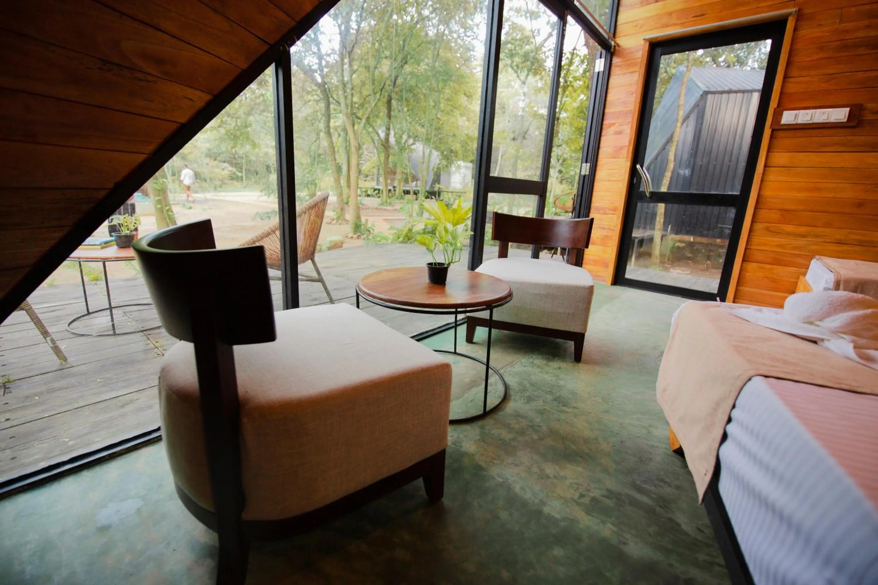 Seating area, Bed in Gabaa Resort & Spa - Habarana