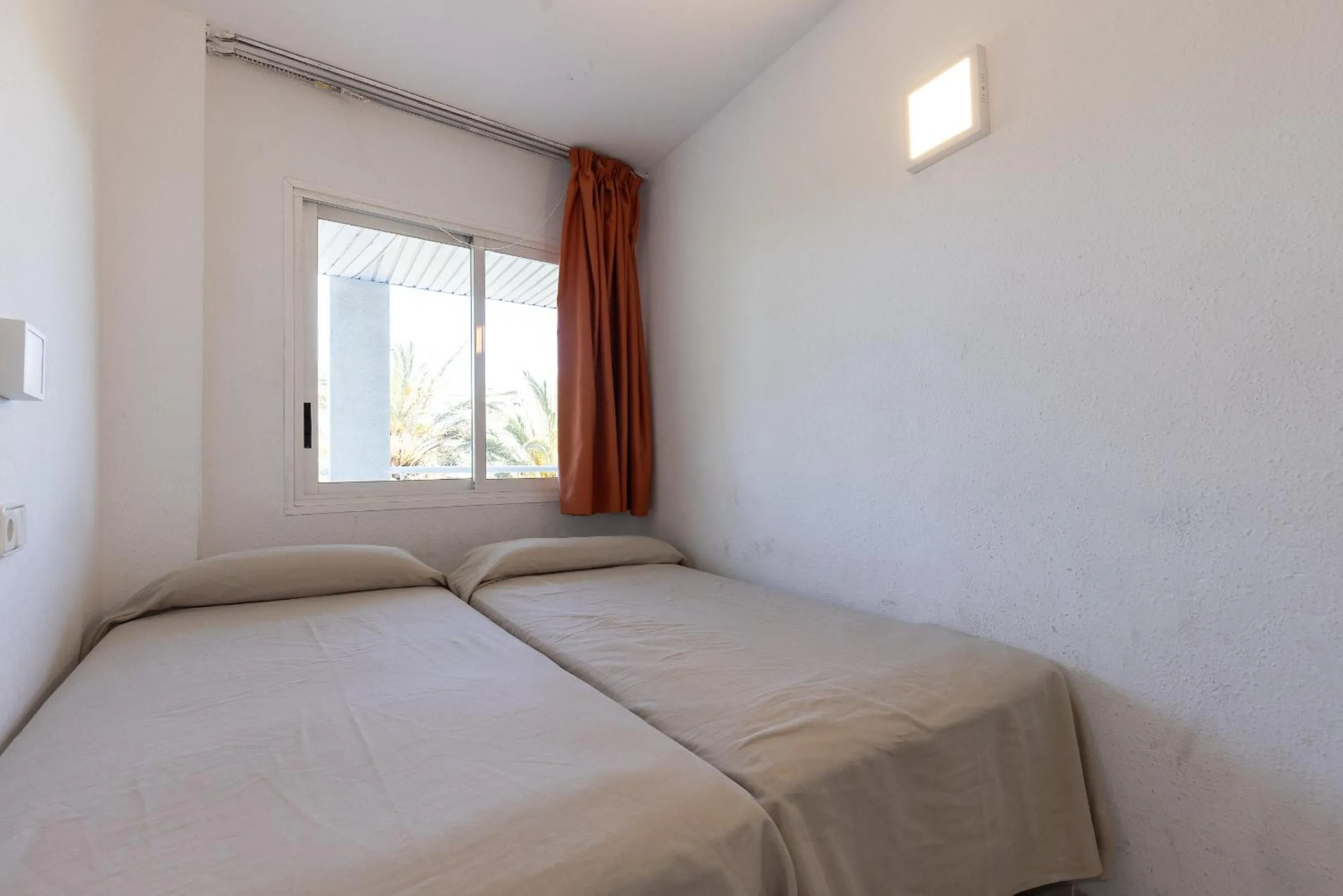 Bed in Rentalmar Royal