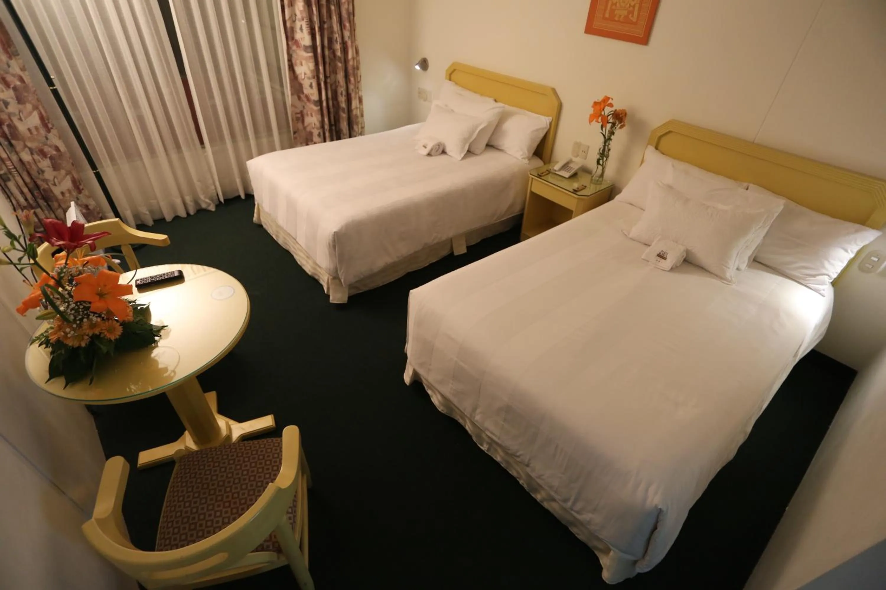 Bed in Plaza Mayor Hotel