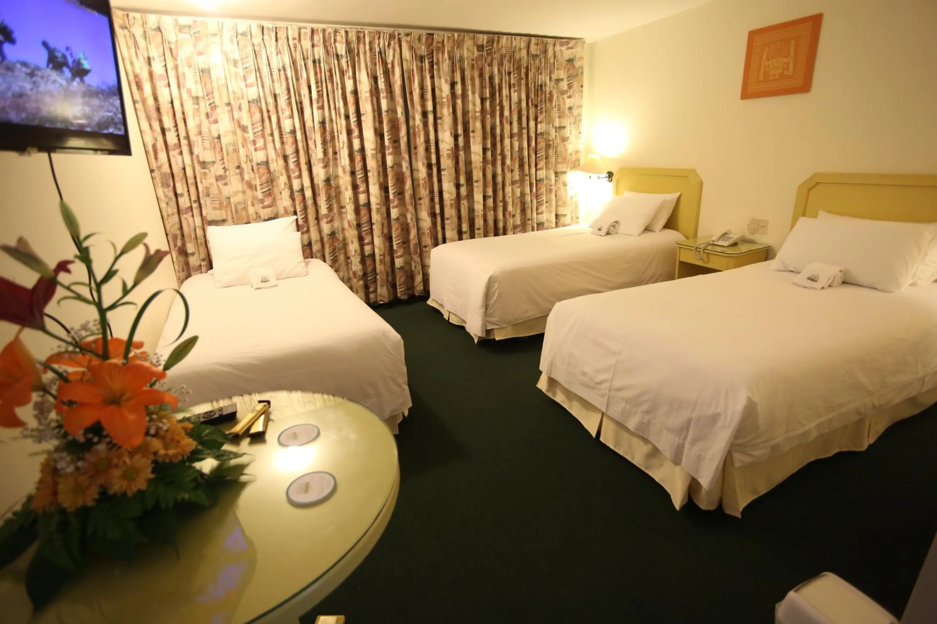 Bed in Plaza Mayor Hotel