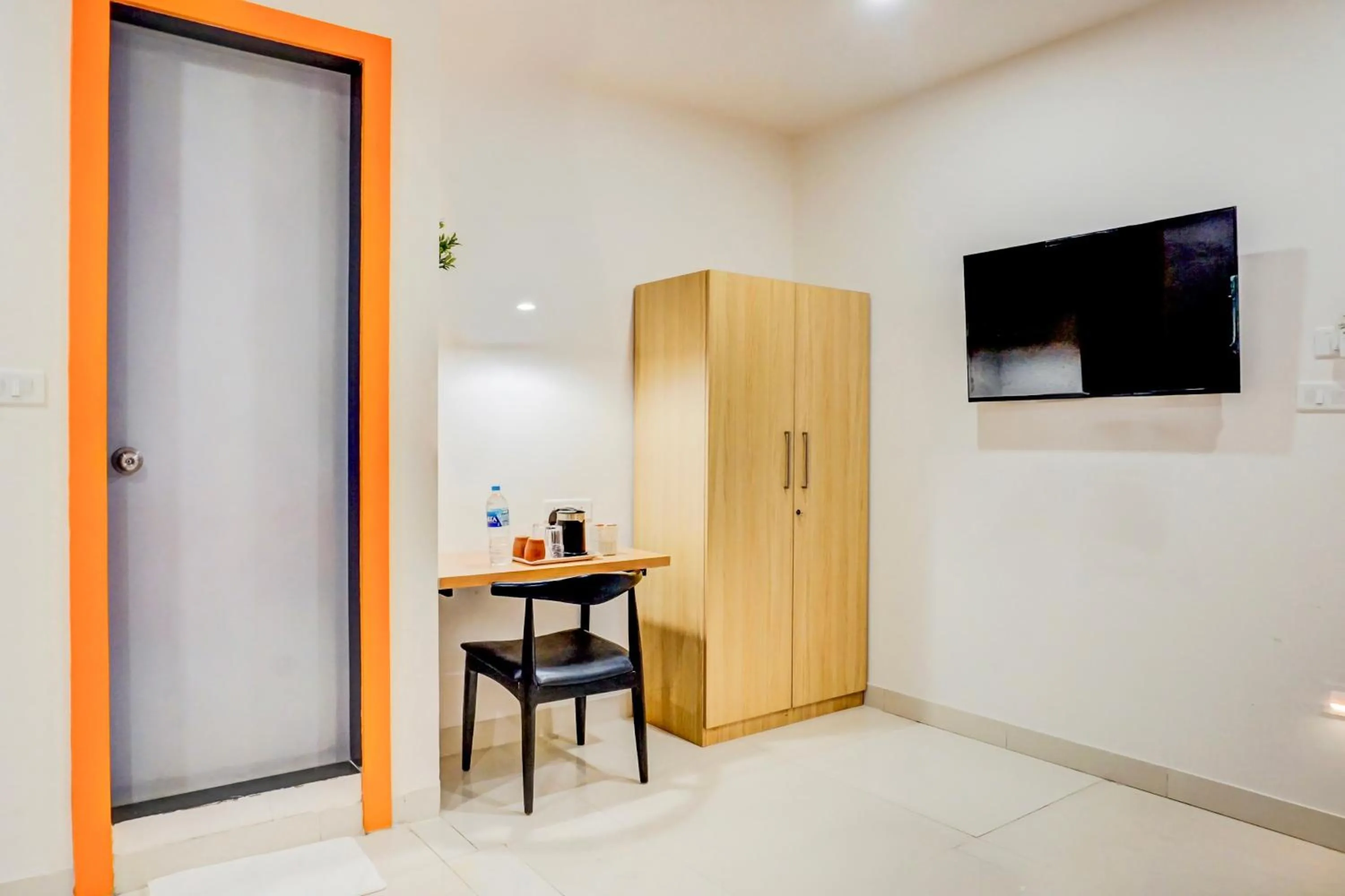 Bedroom in Super Townhouse Hadapsar formerly Savali Inn