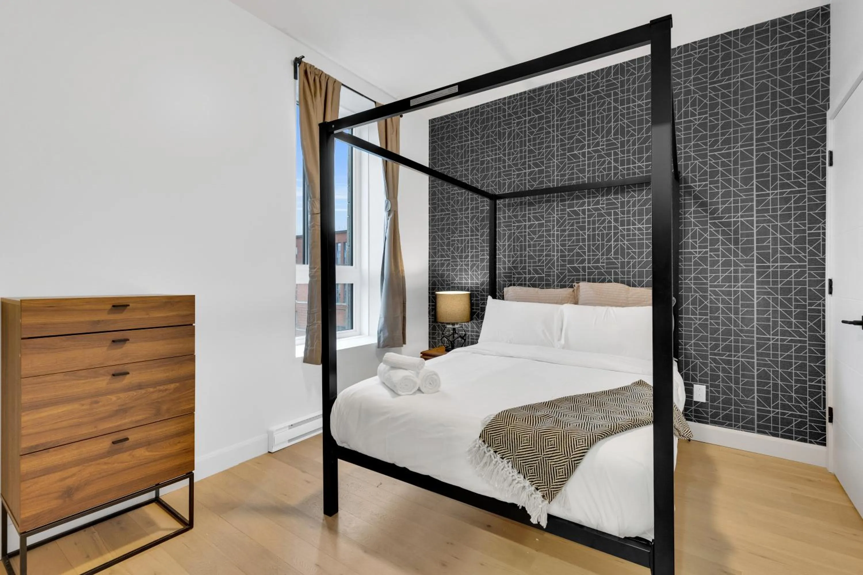 Bed in Deluxe Suites Downtown Montreal