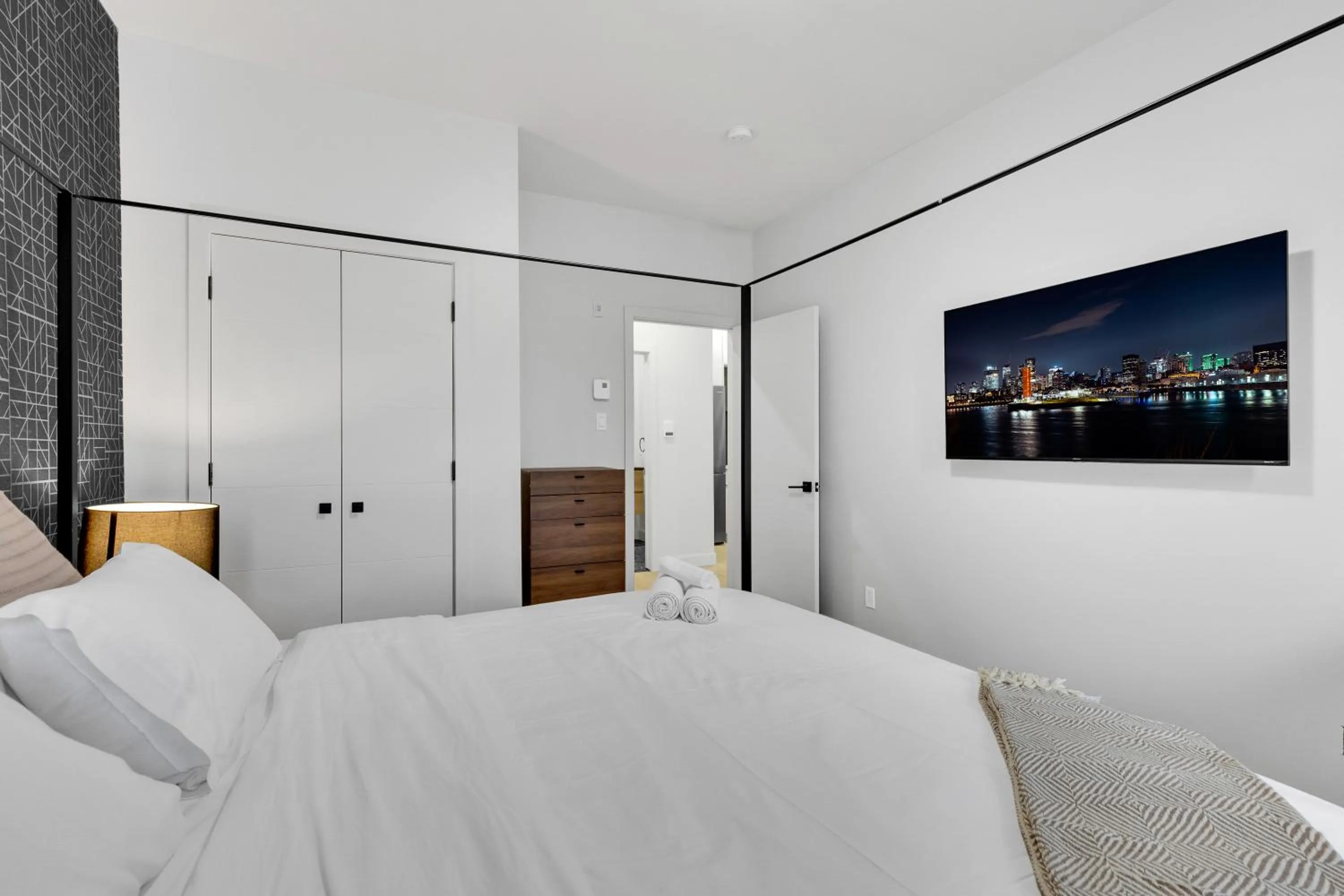 Bed in Deluxe Suites Downtown Montreal