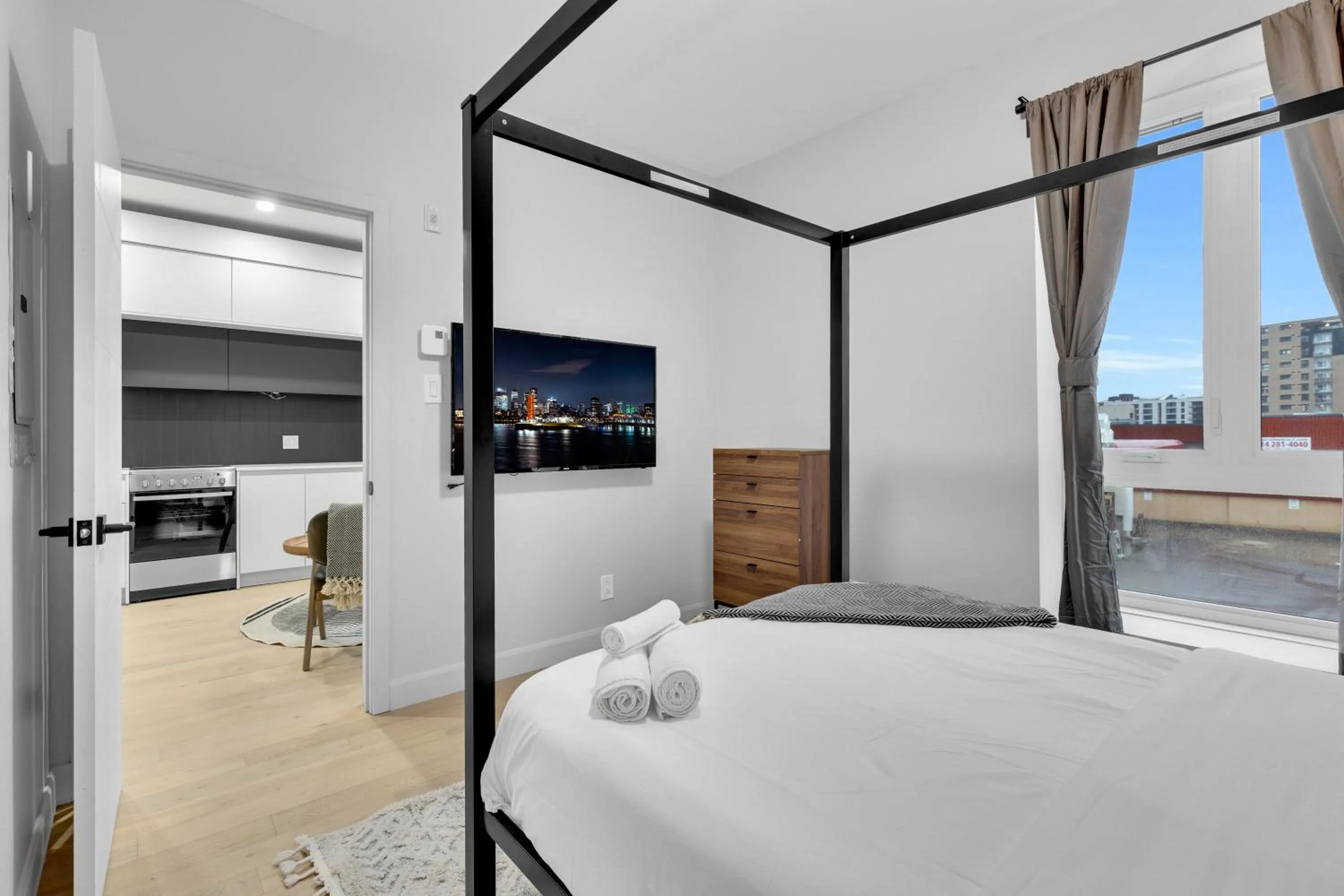 Bed in Deluxe Suites Downtown Montreal