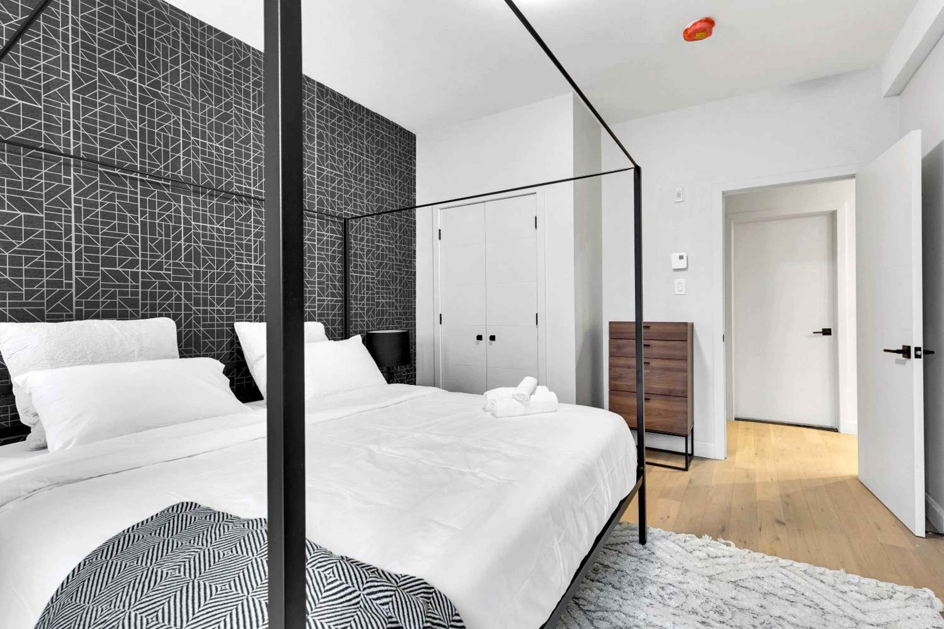 Bed in Deluxe Suites Downtown Montreal