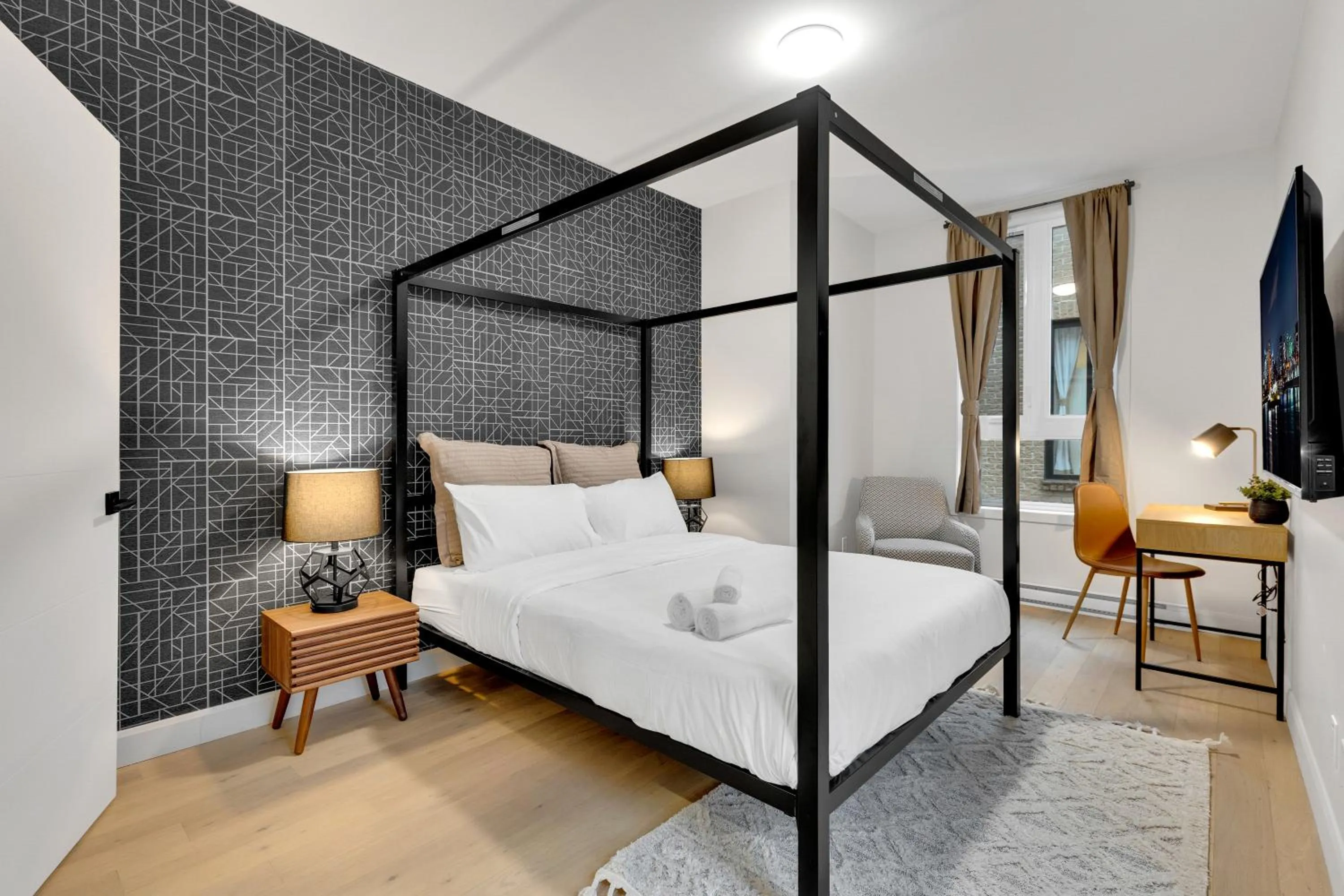 Bed in Deluxe Suites Downtown Montreal