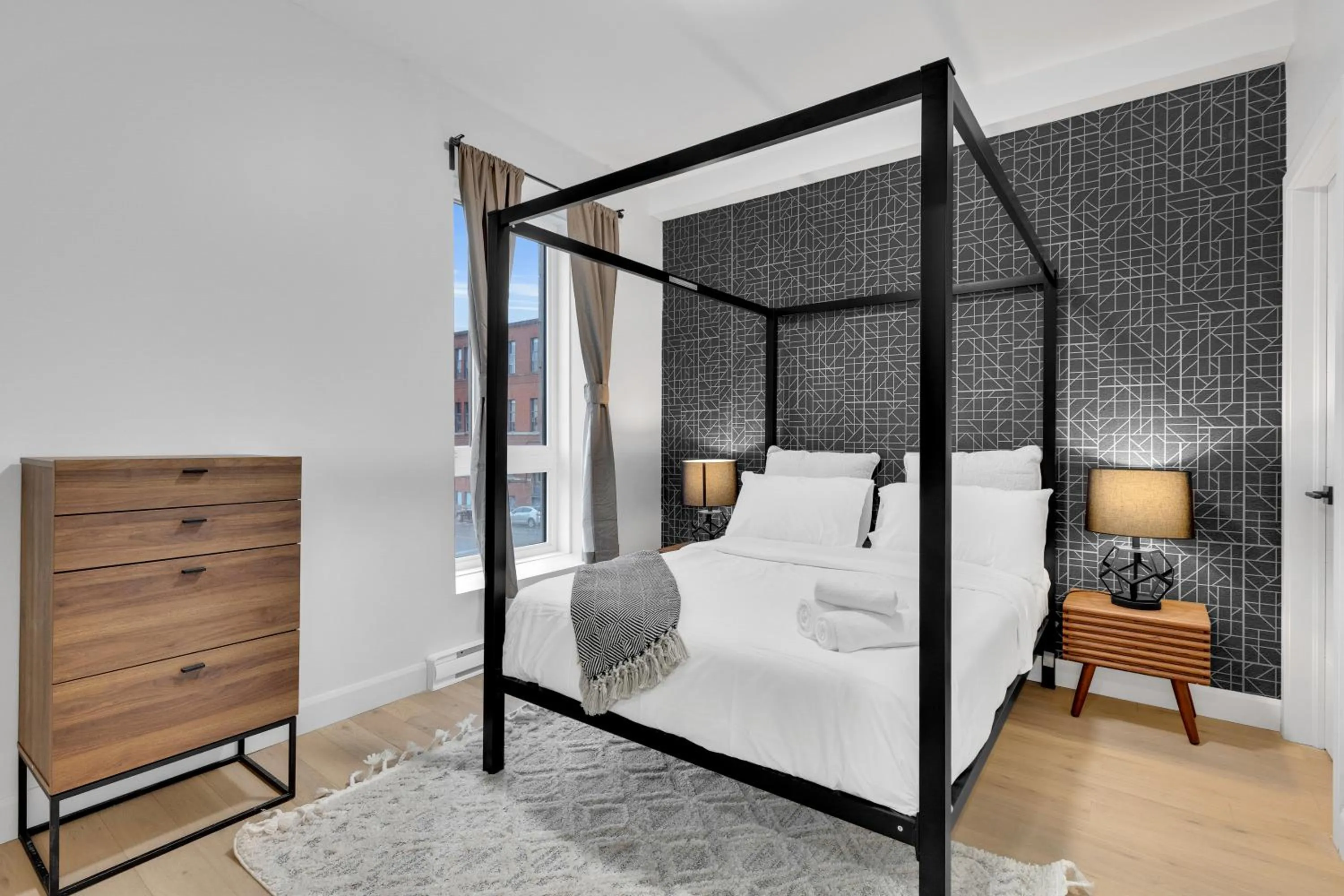 Bed in Deluxe Suites Downtown Montreal