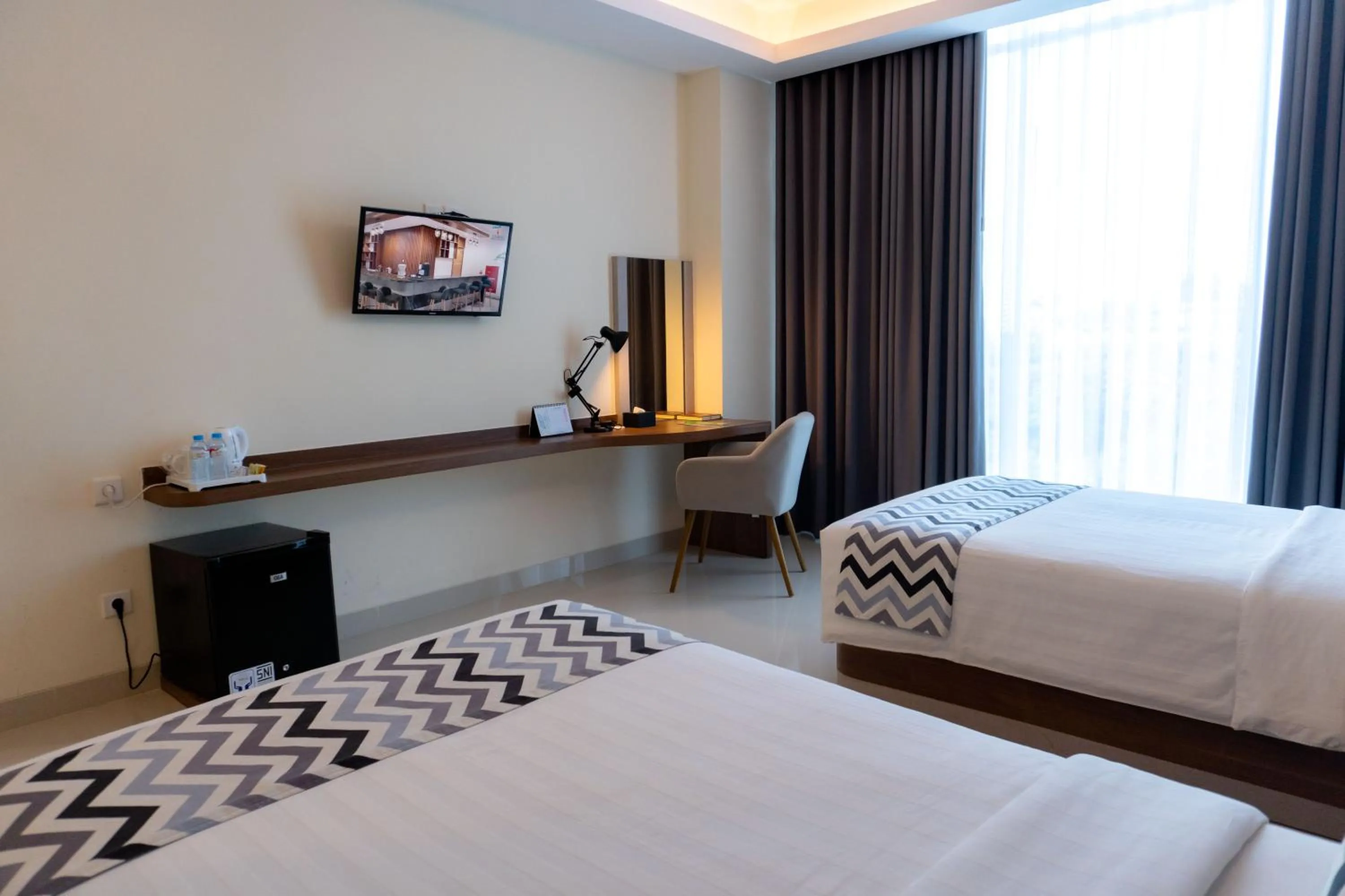 Bed in UNHAS HOTEL & CONVENTION