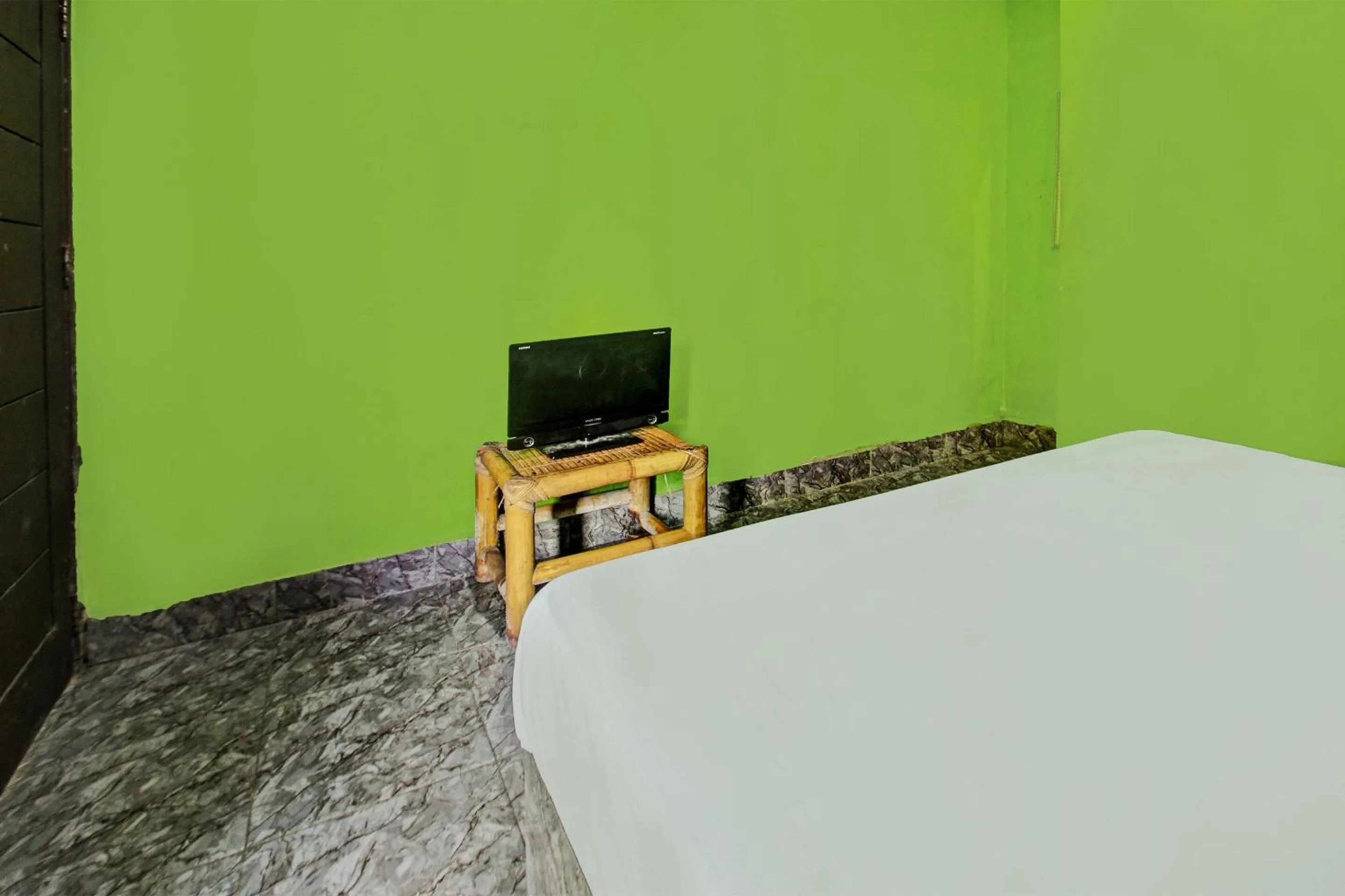 Bedroom in Hotel O Ashooy HomestayNearWisata Desa sedau