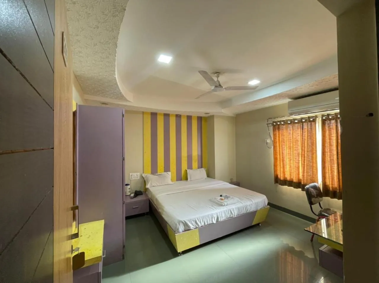 Bedroom in Hotel Holiday Pride