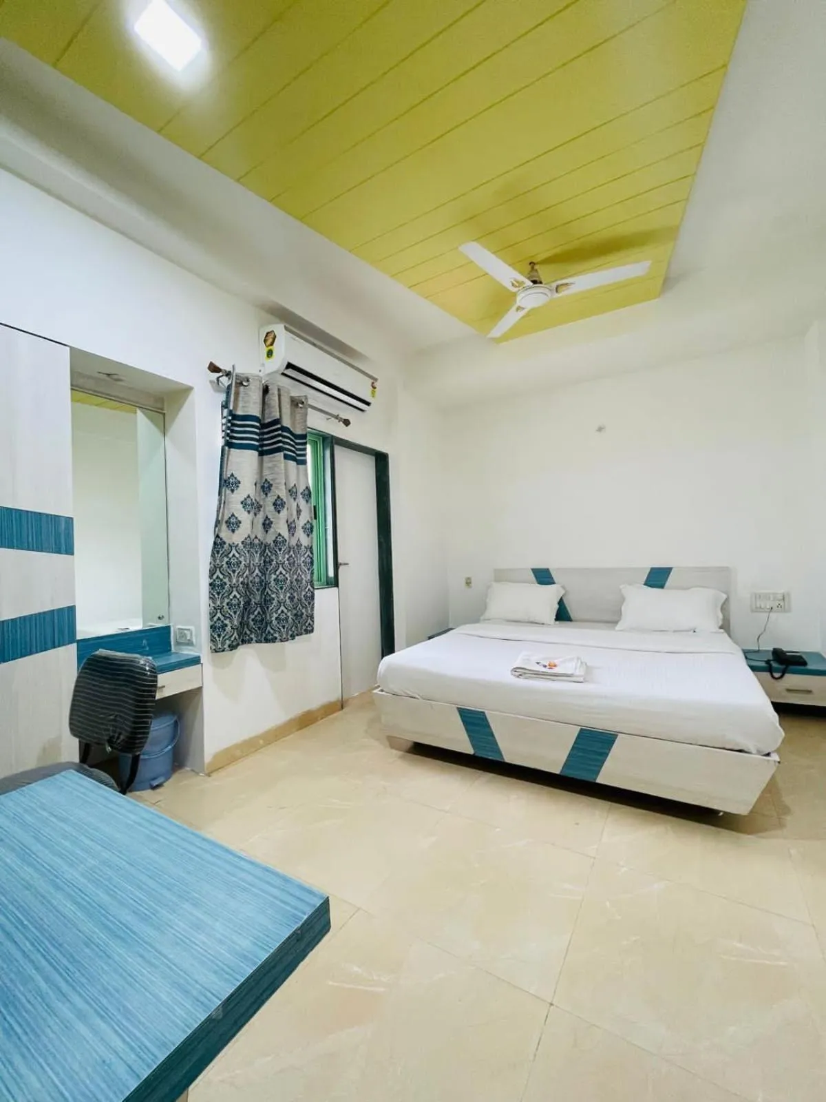 Bedroom in Hotel Holiday Pride