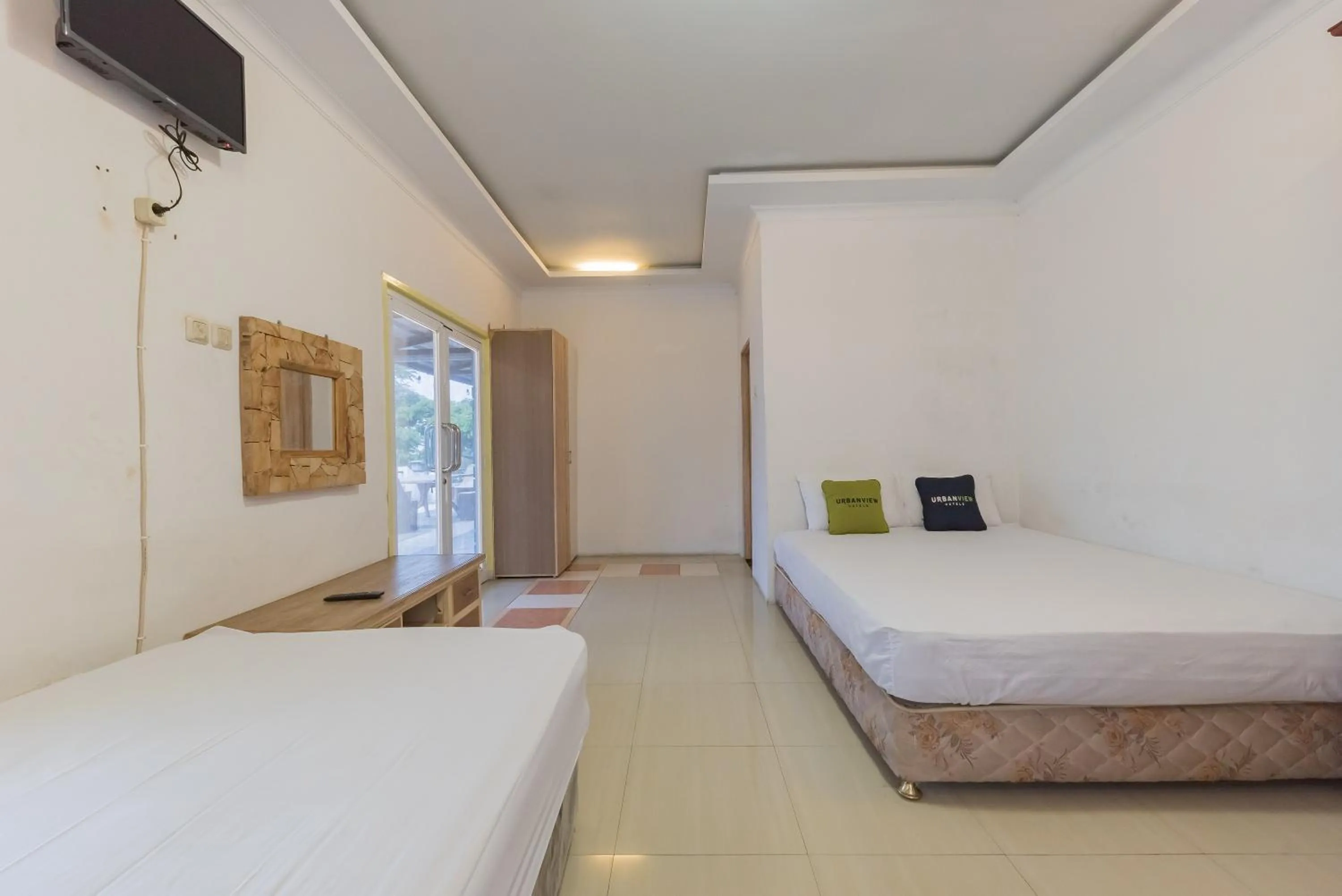 Bed in Urbanview Hotel Anggrek Puncak by RedDoorz