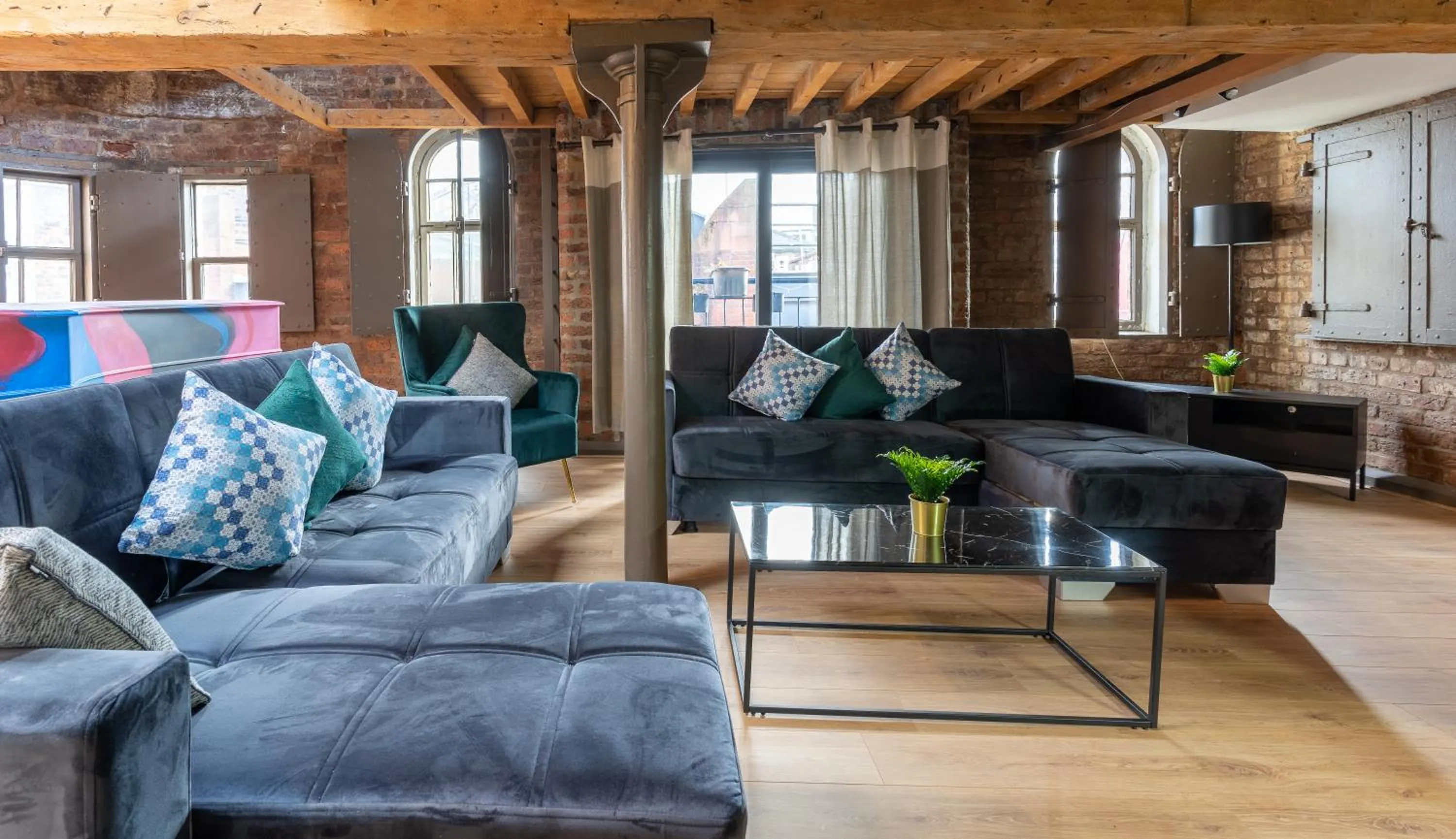 Seating area in Rainford Gardens by UStay Aparthotels