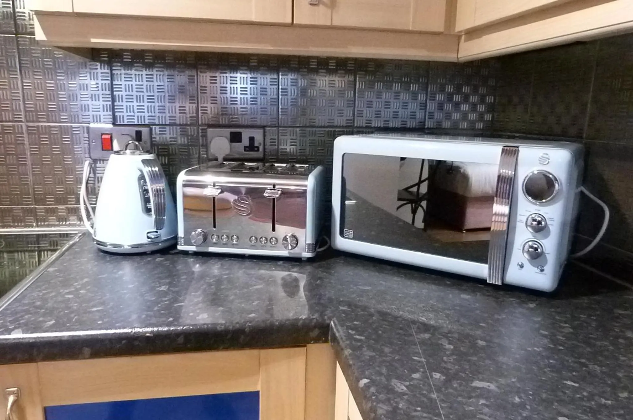 Kitchen or kitchenette in Rainford Gardens by UStay Aparthotels