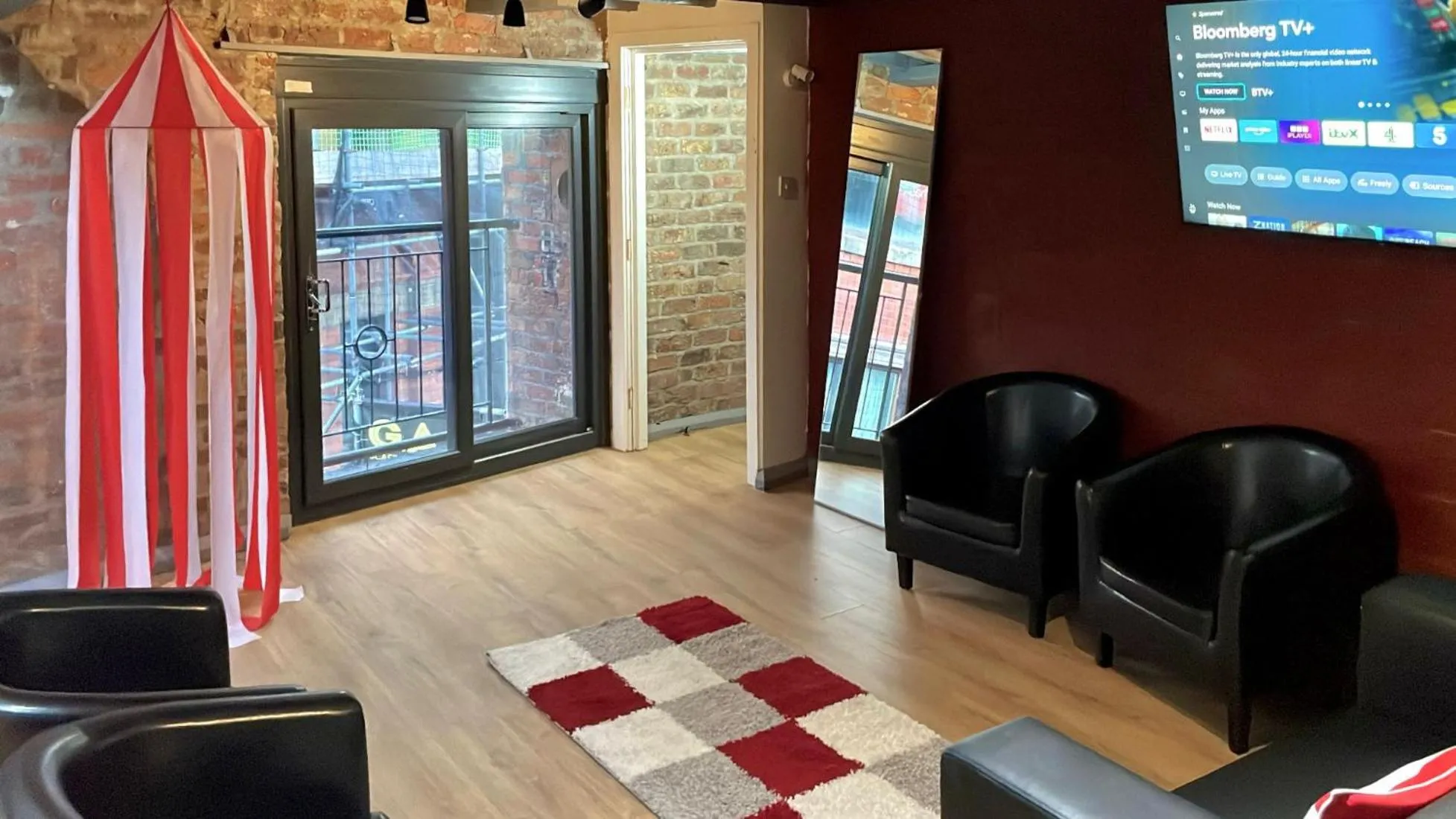 Living room in Rainford Gardens by UStay Aparthotels