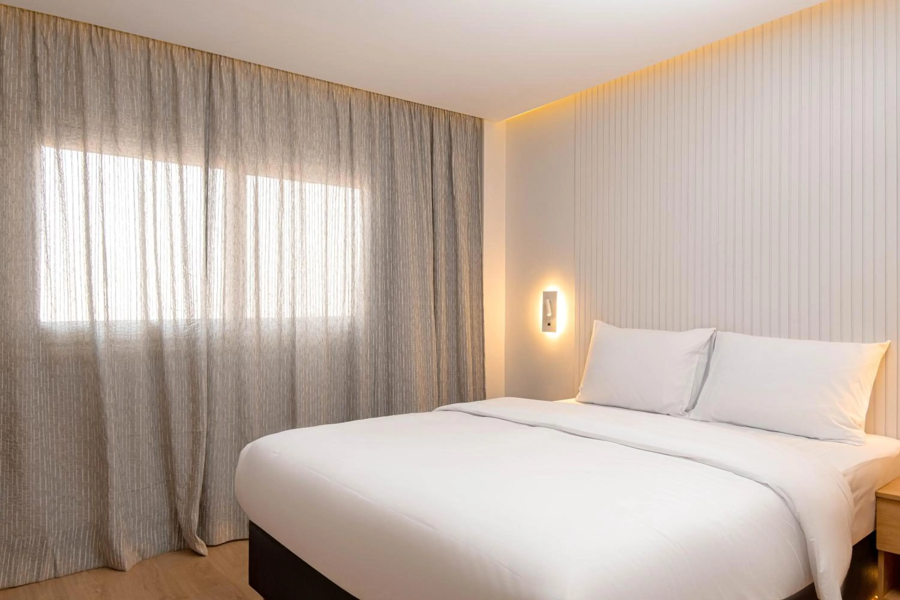 Bed in Parkside Boutique Serviced Apartments