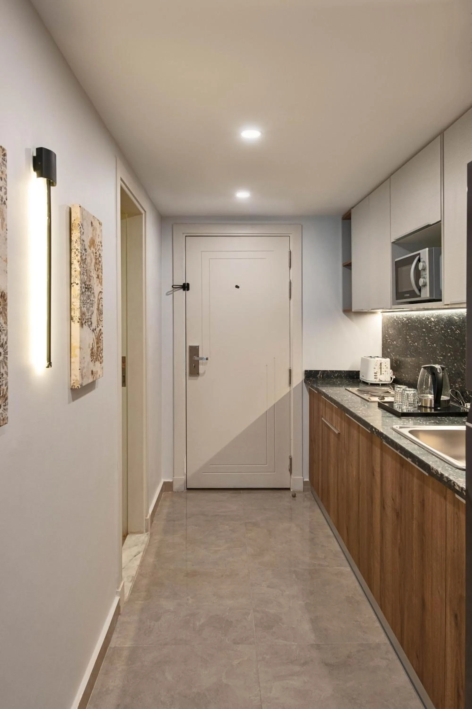 Kitchen or kitchenette in Parkside Boutique Serviced Apartments