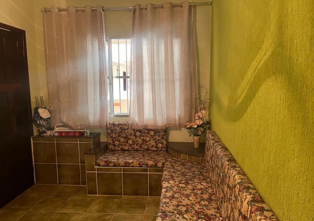 Living room in Apartamento Vila Tupi Praia Grande