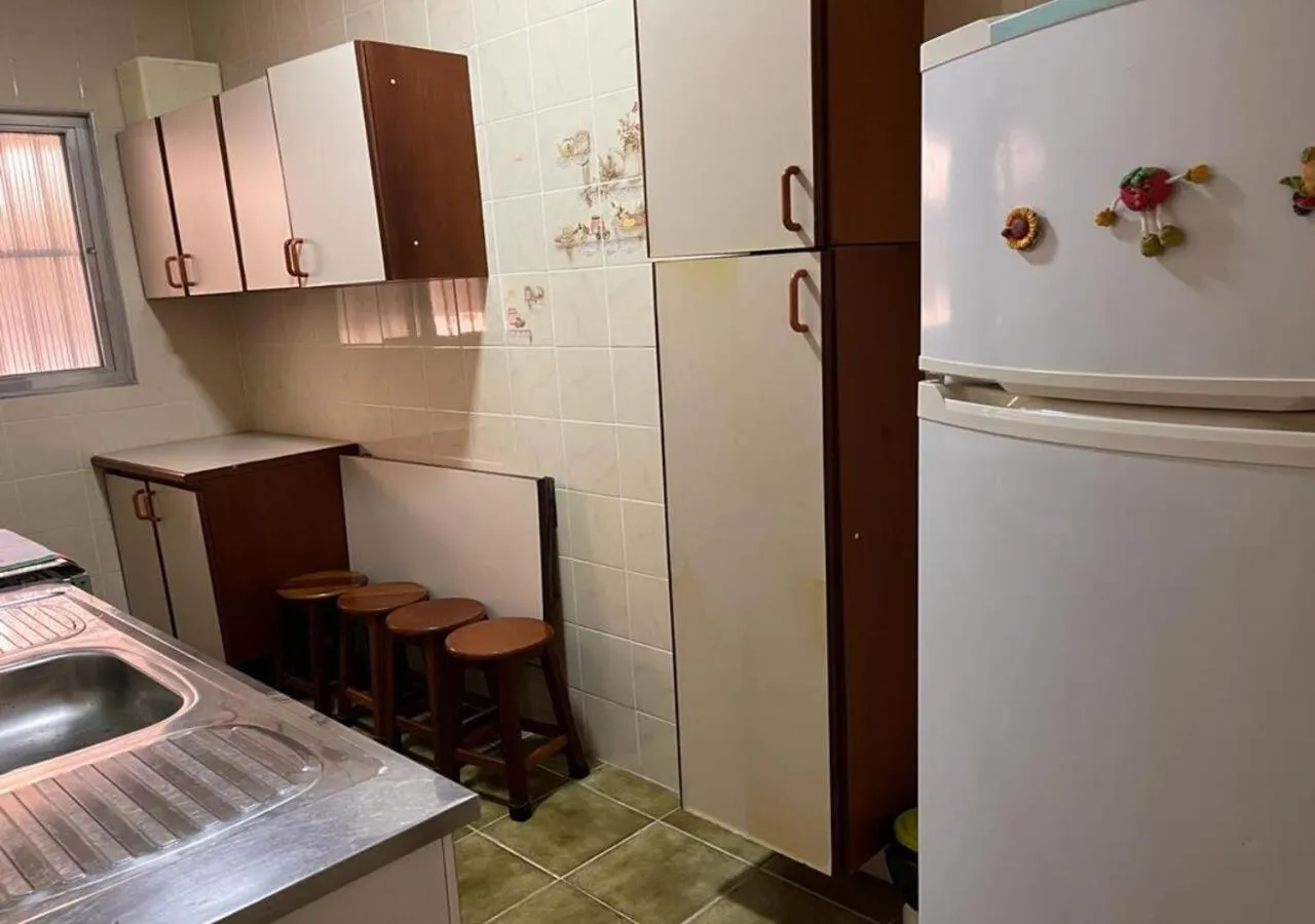 Kitchen or kitchenette in Apartamento Vila Tupi Praia Grande