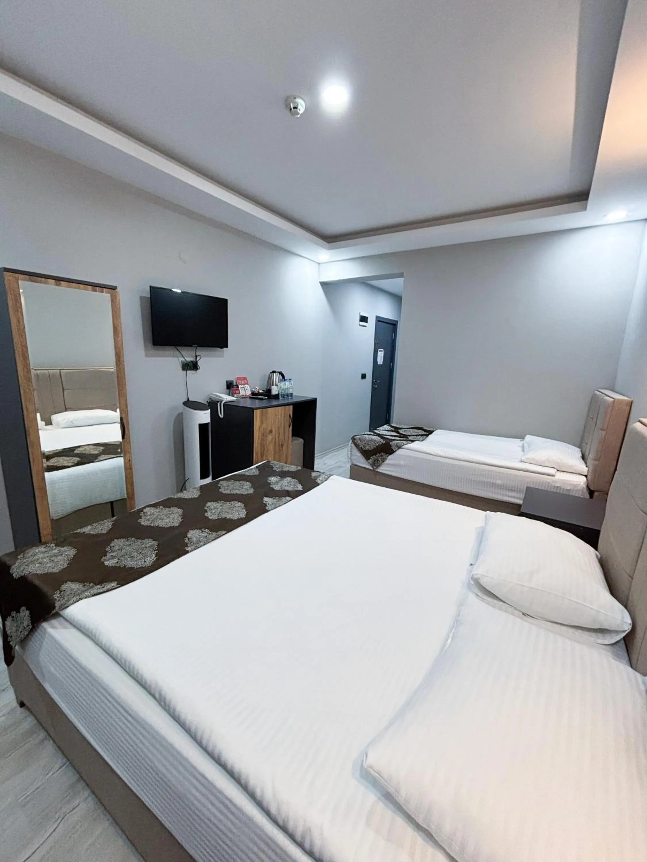 Bed in Whitestone Hotel