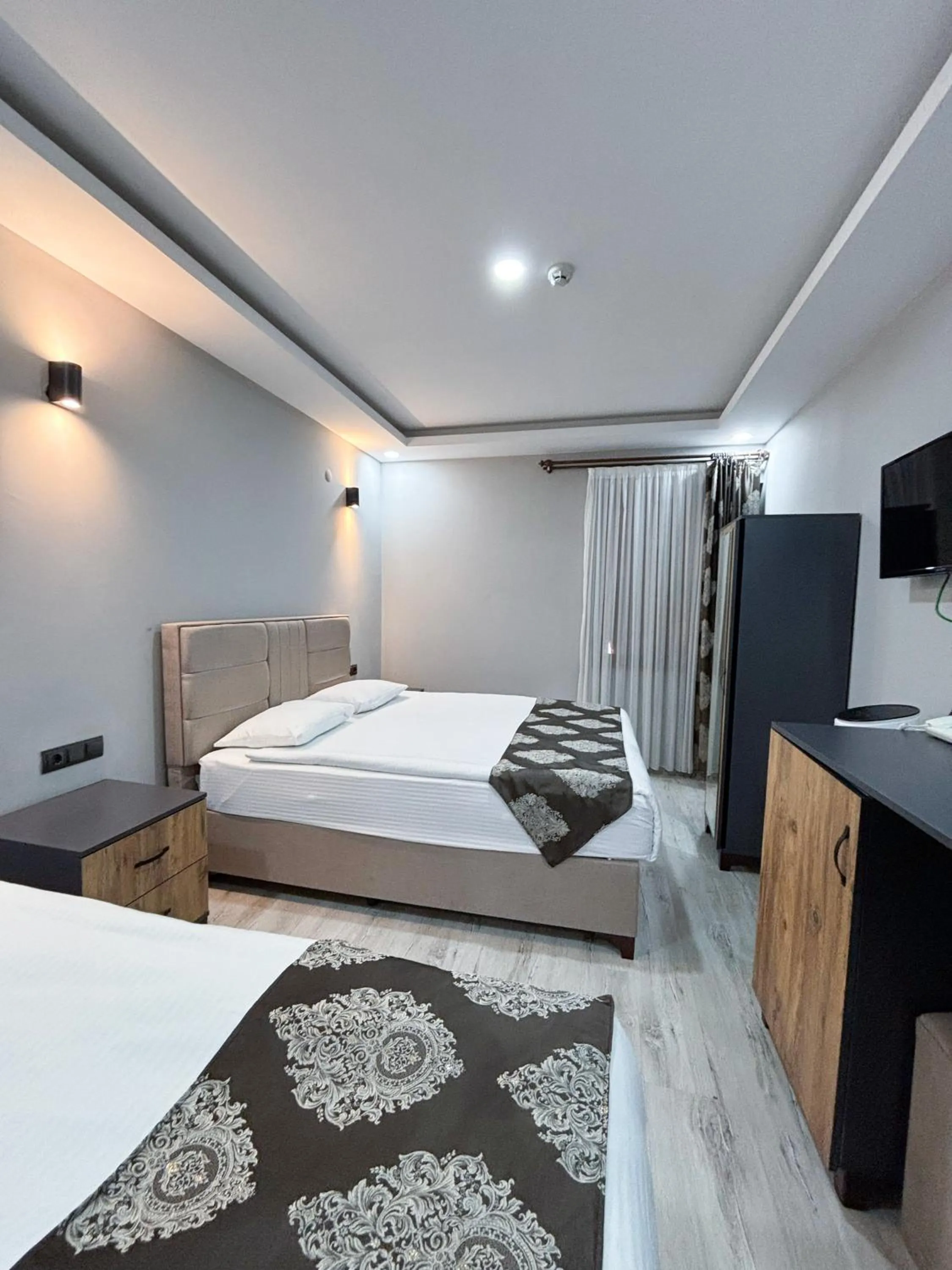 Bed in Whitestone Hotel