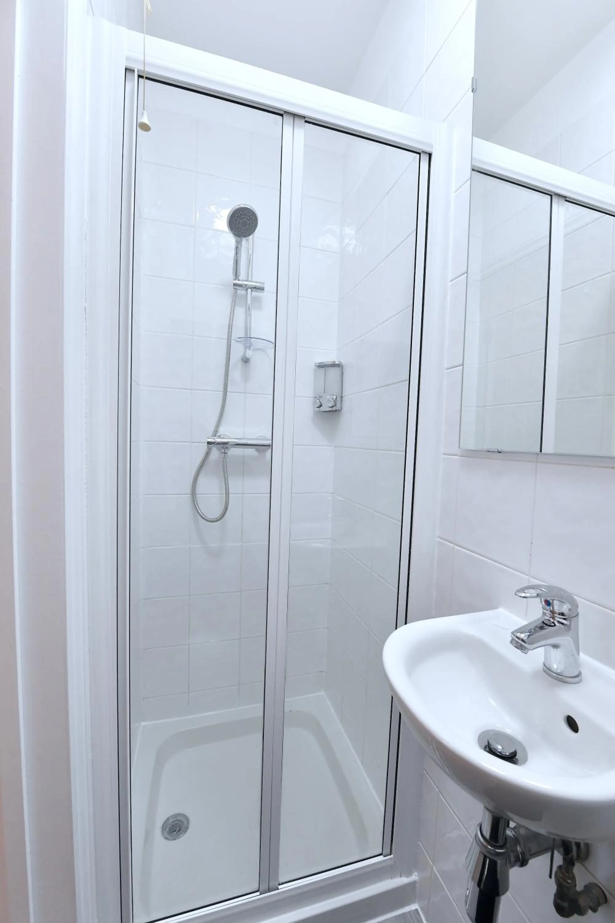 Shower in Stylish Studios by Luxestays Fulham