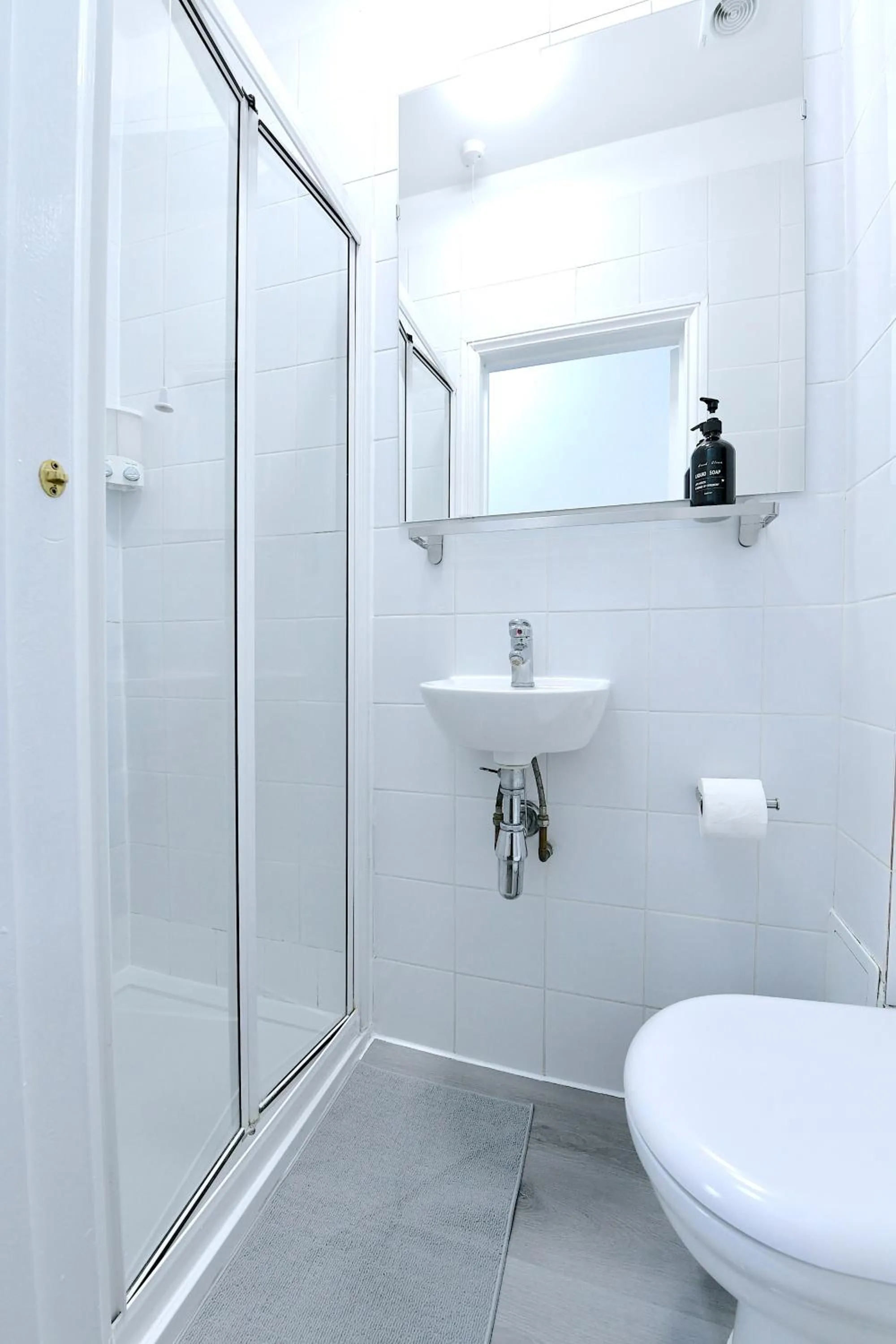 Shower in Stylish Studios by Luxestays Fulham