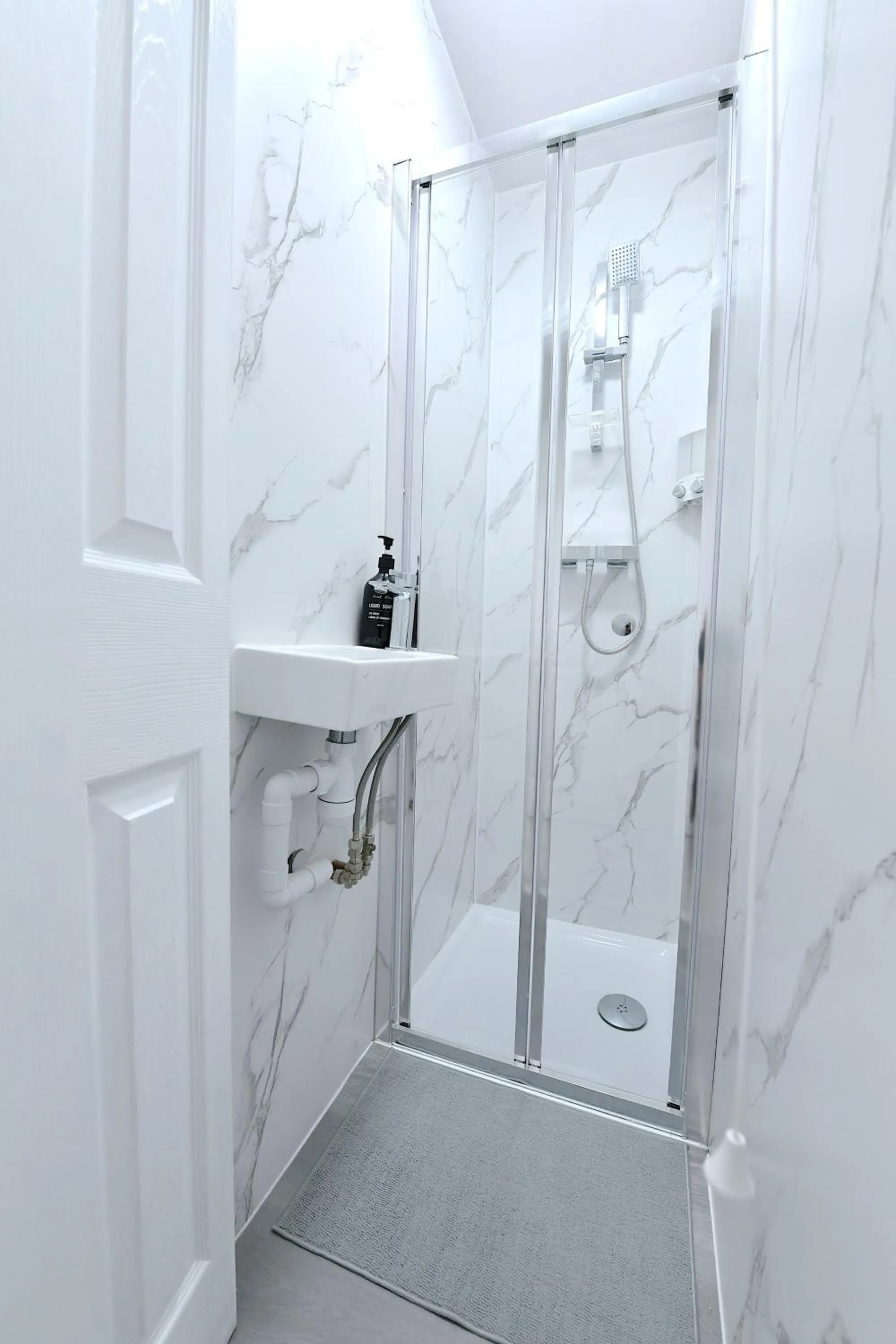 Shower in Stylish Studios by Luxestays Fulham