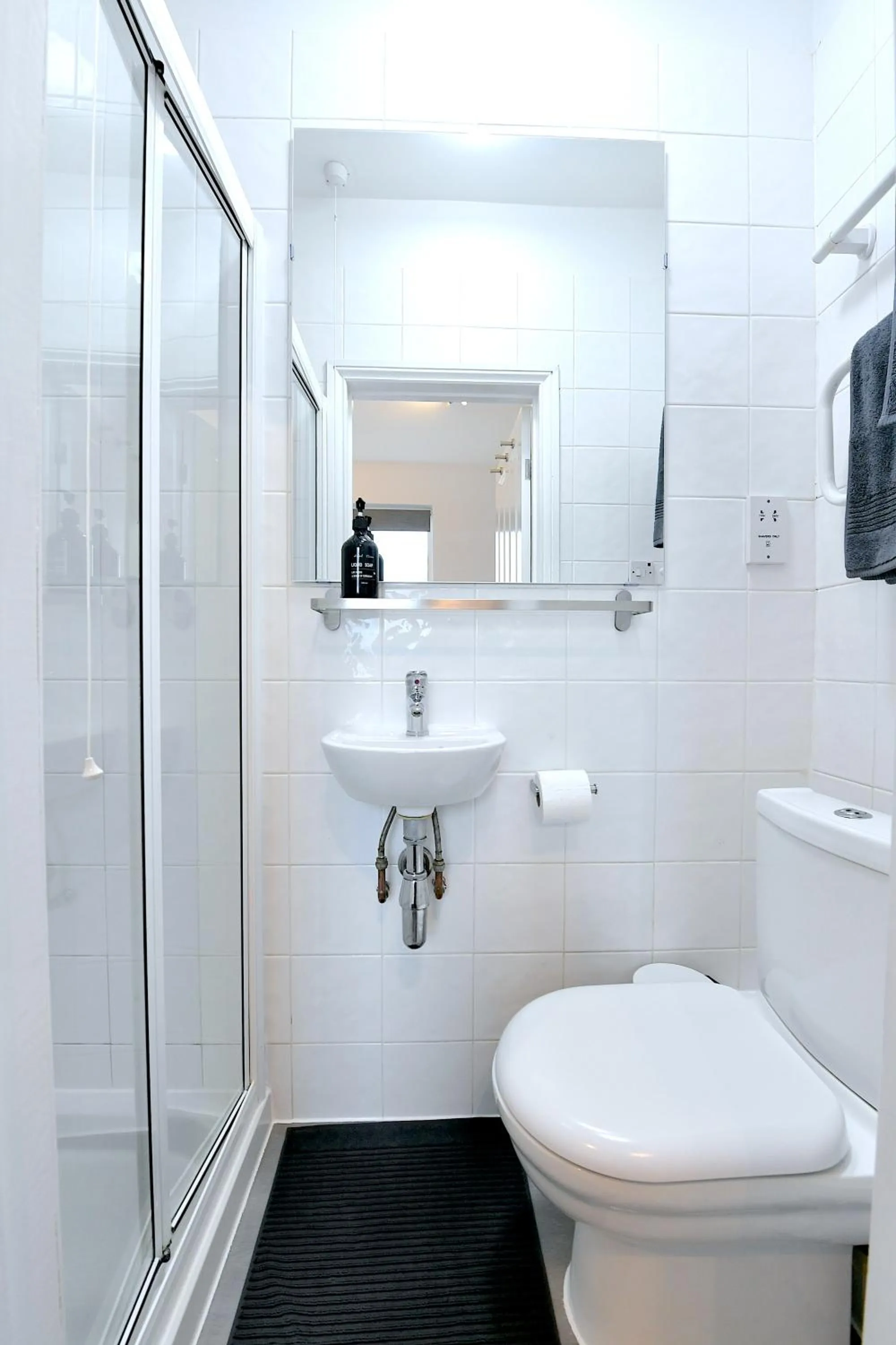 Shower in Stylish Studios by Luxestays Fulham