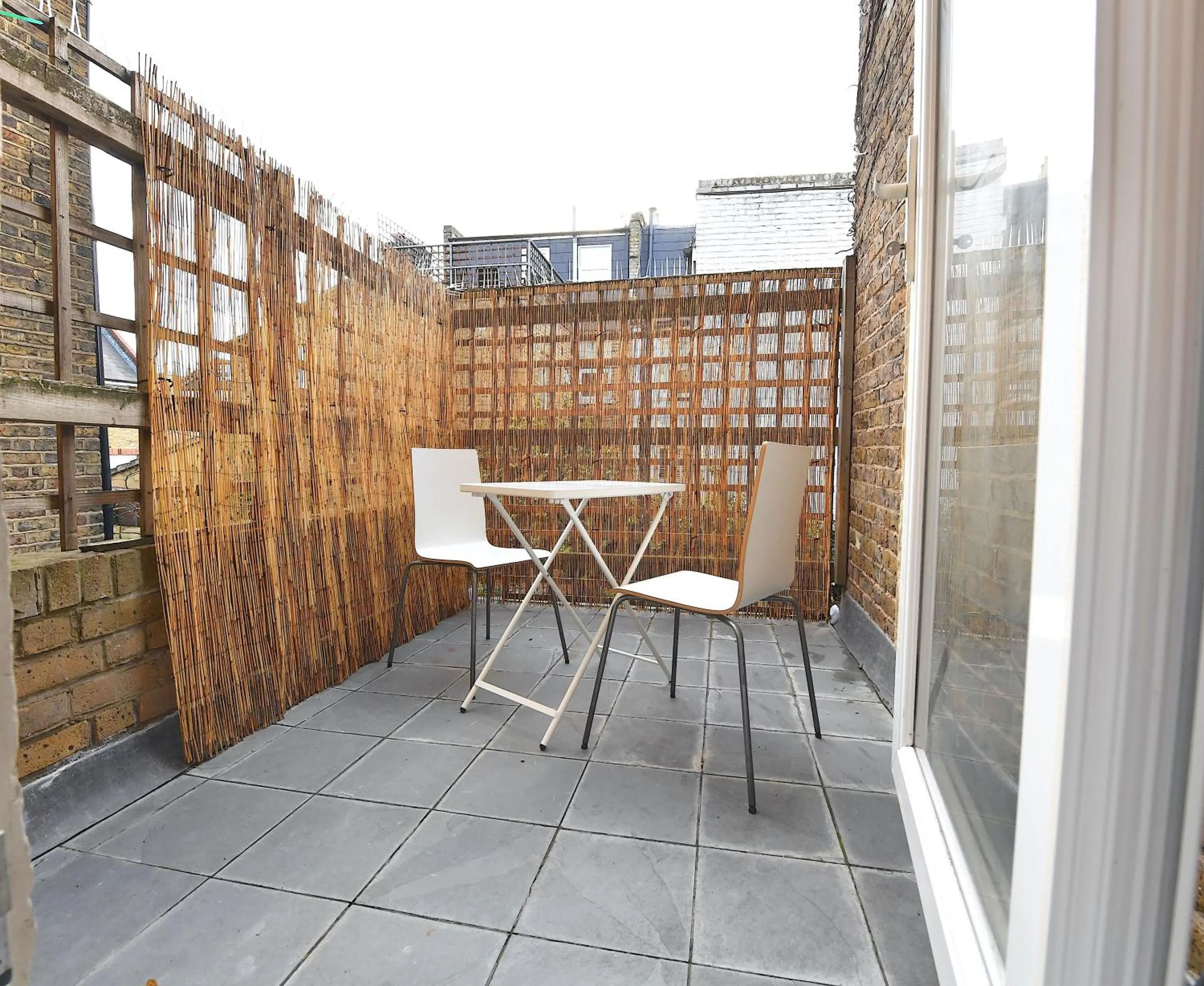 Patio in Stylish Studios by Luxestays Fulham