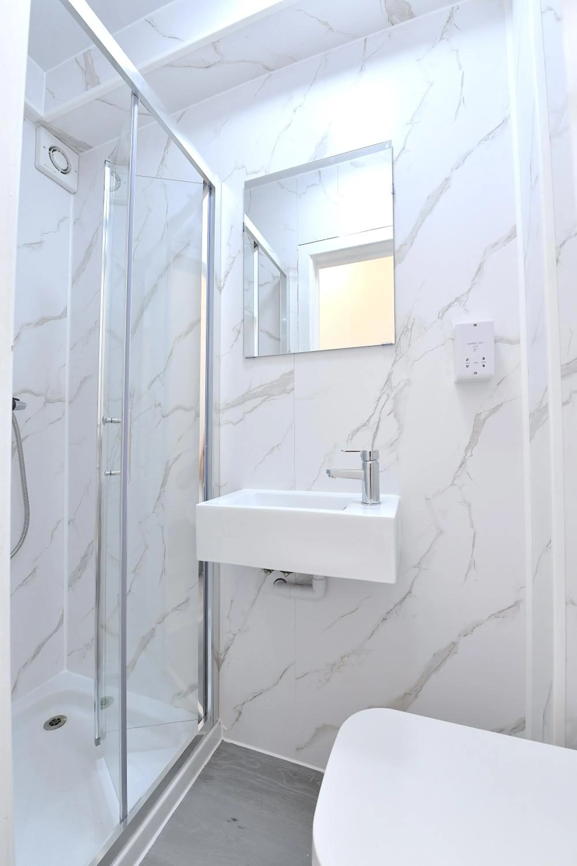 Shower in Stylish Studios by Luxestays Fulham