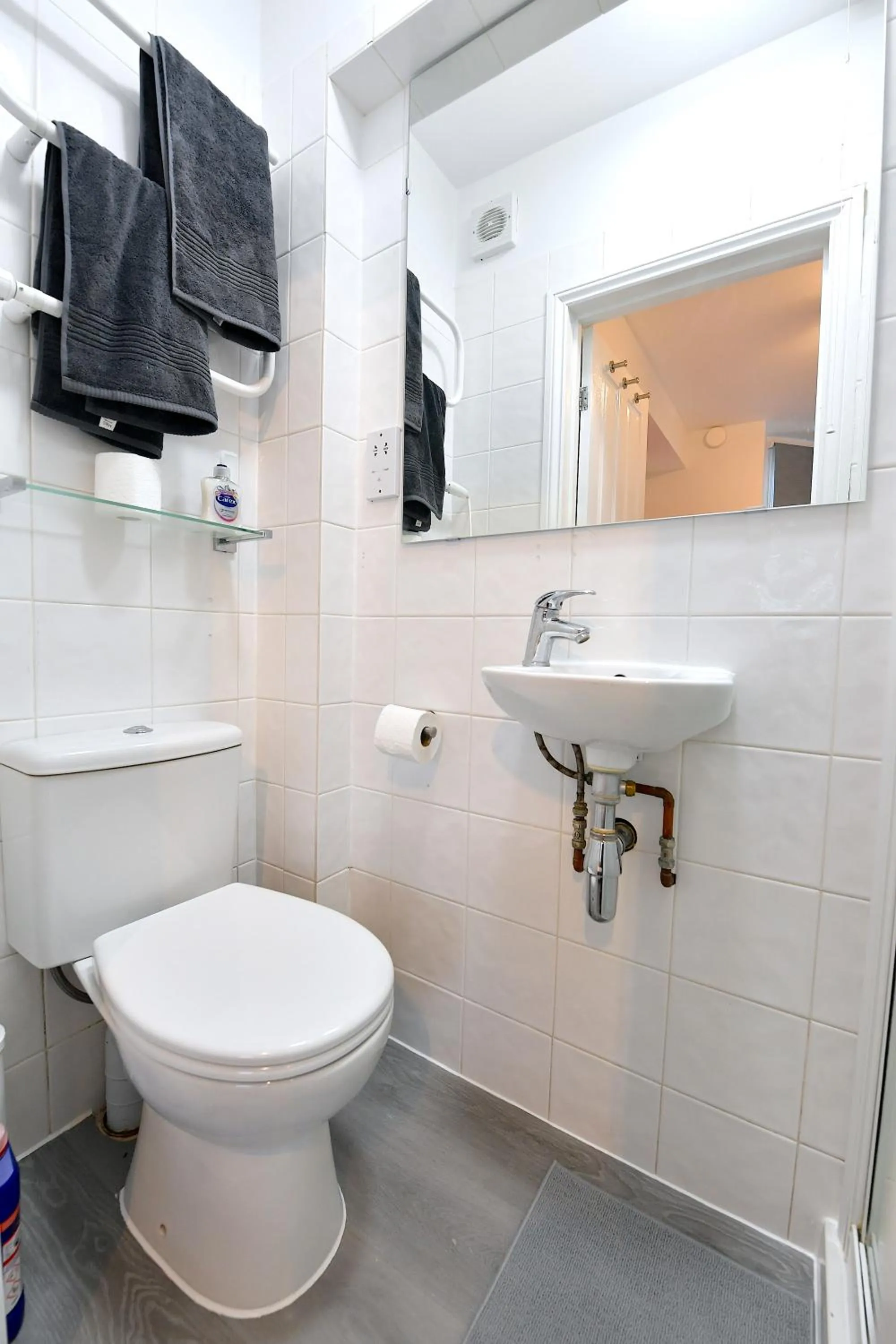 Toilet in Stylish Studios by Luxestays Fulham