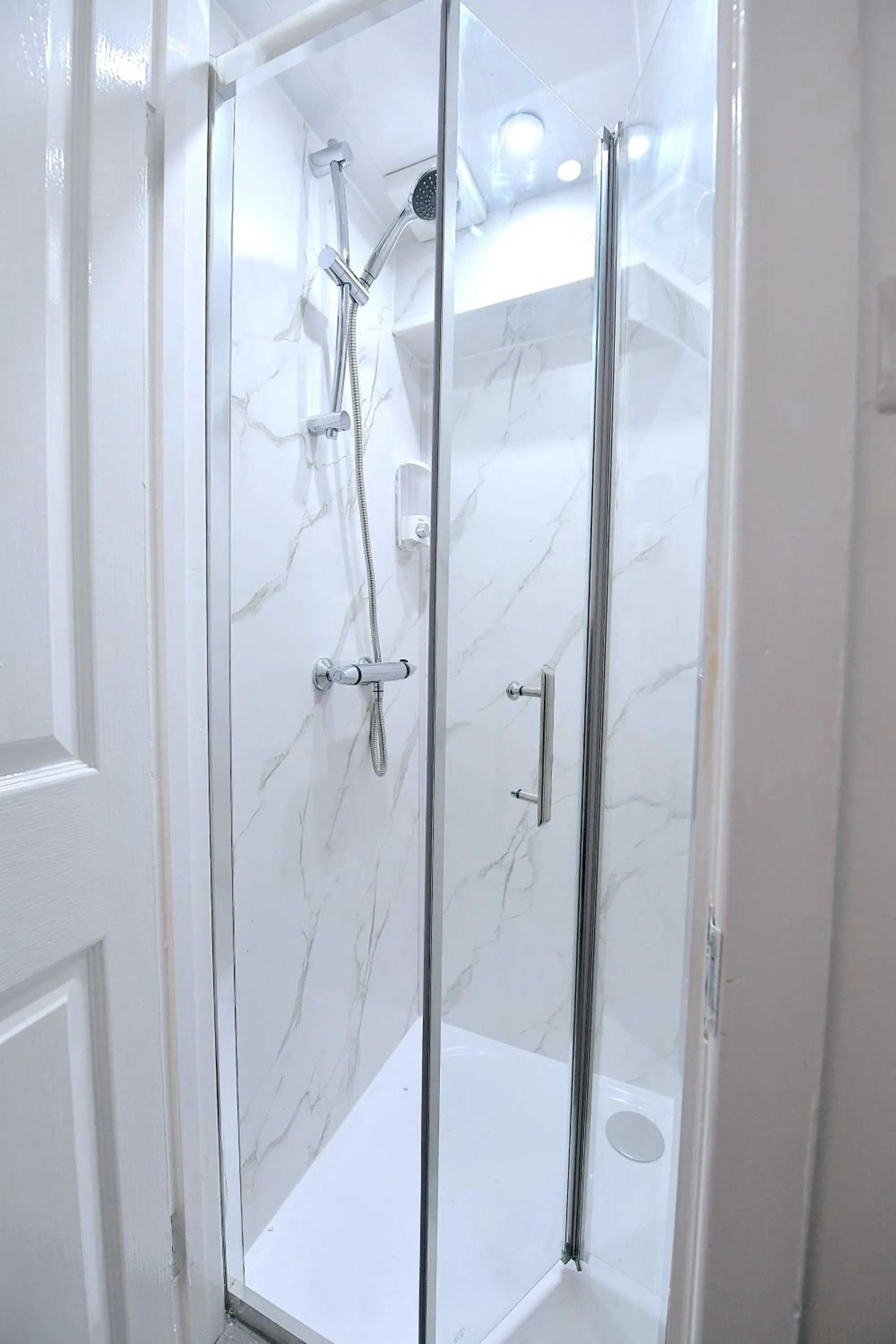 Shower in Stylish Studios by Luxestays Fulham
