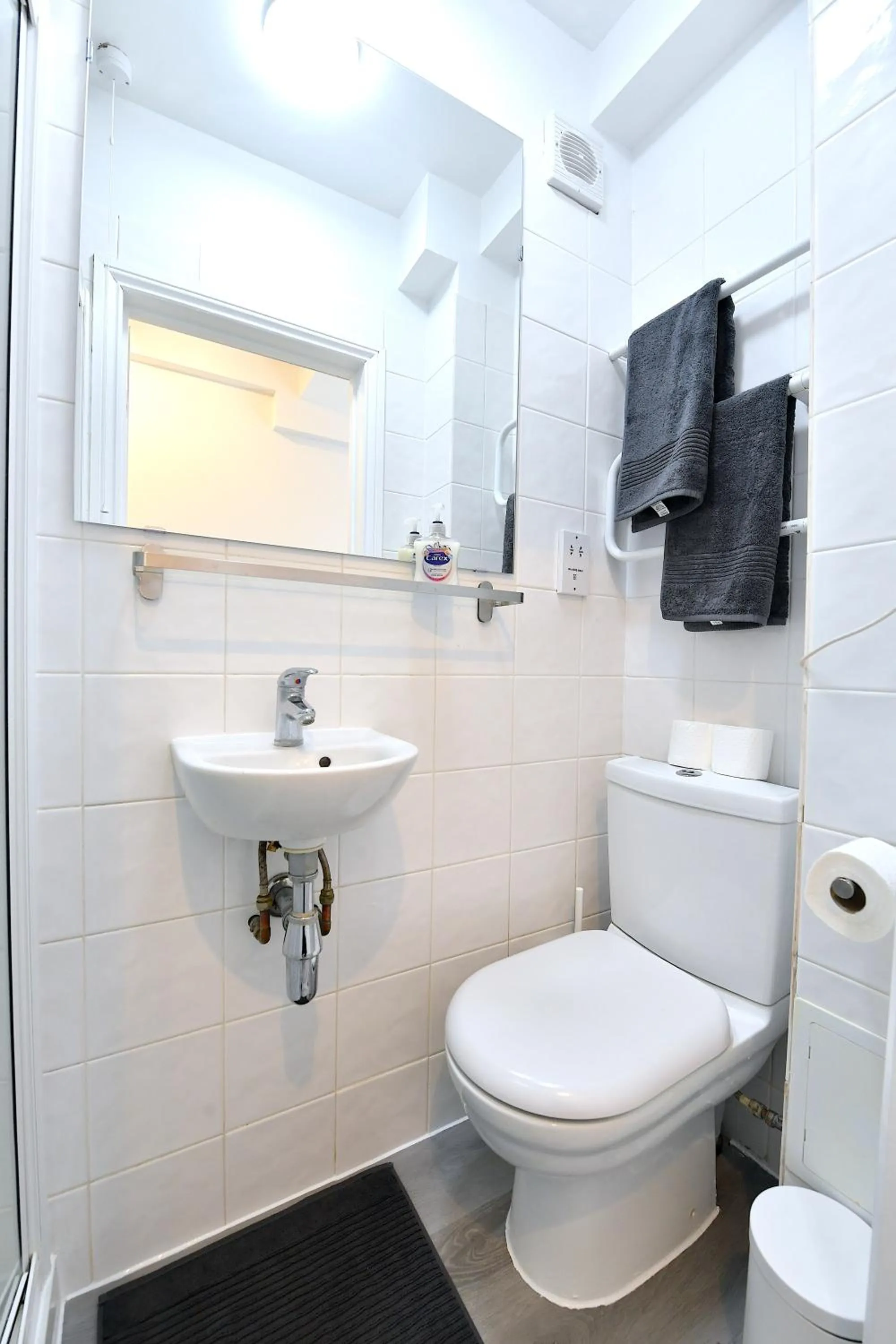 Toilet in Stylish Studios by Luxestays Fulham