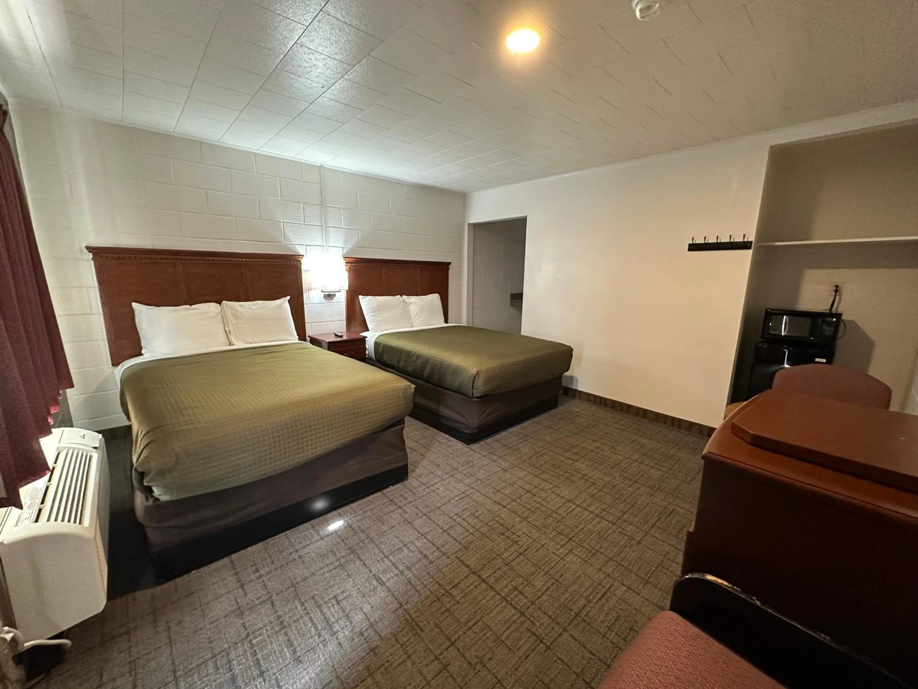 Living room, Bed in Llano Motel