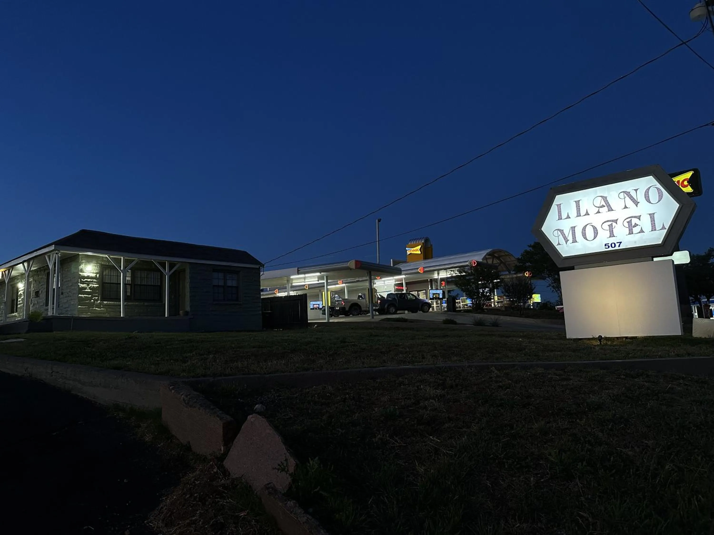 Property logo or sign in Llano Motel