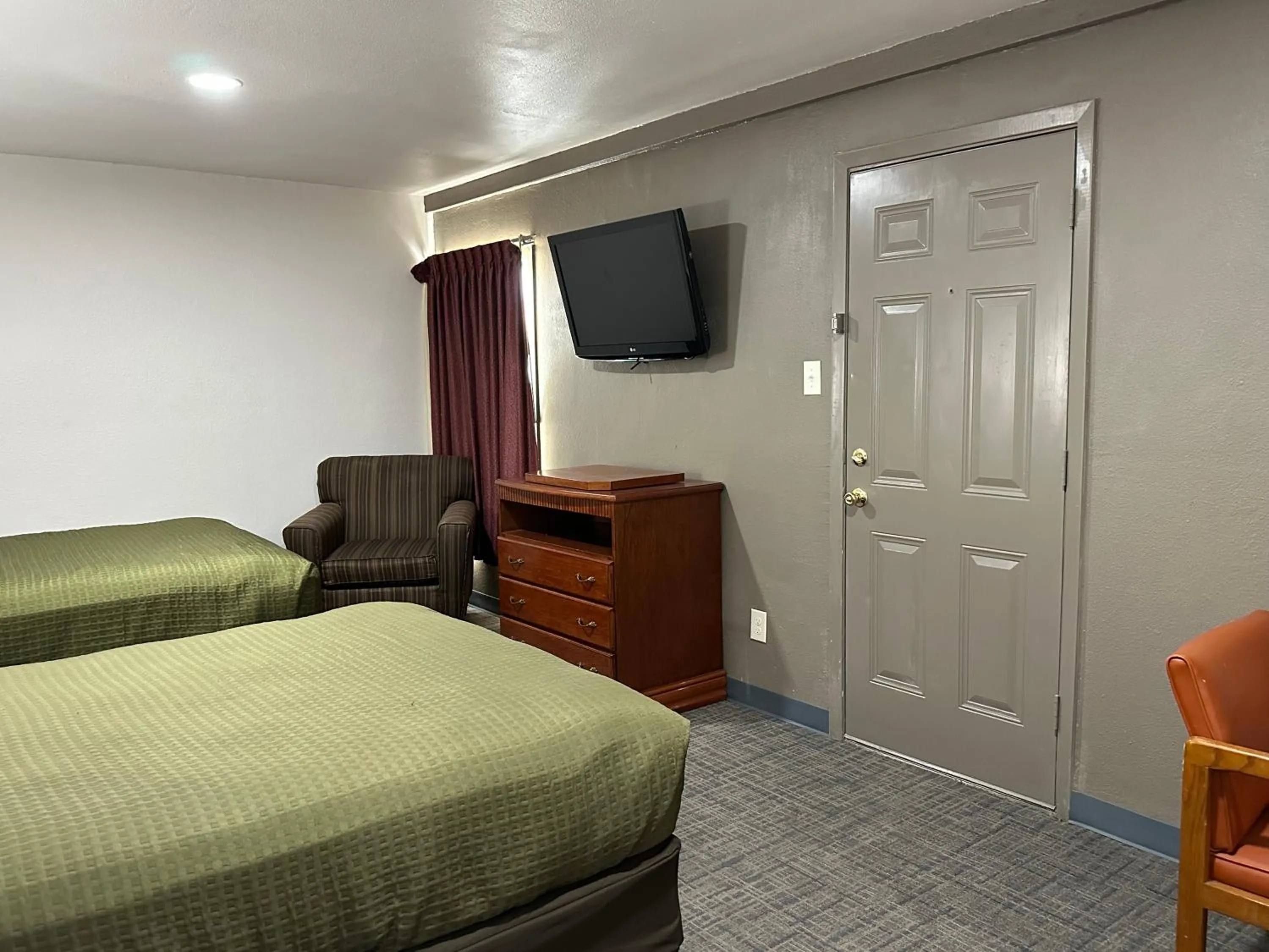 Living room, Bed in Llano Motel
